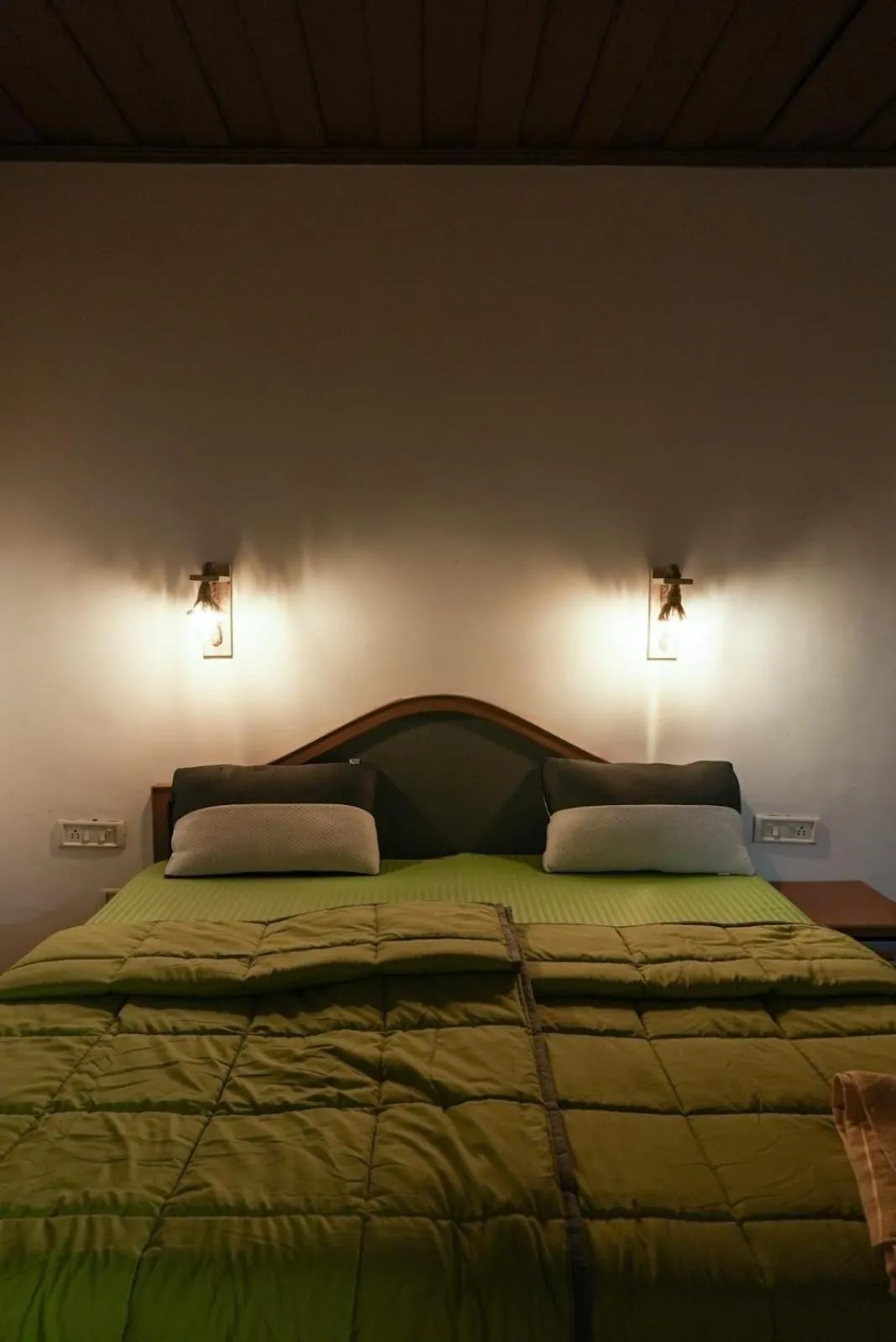 Bed in The Nirvana Resort Munnar