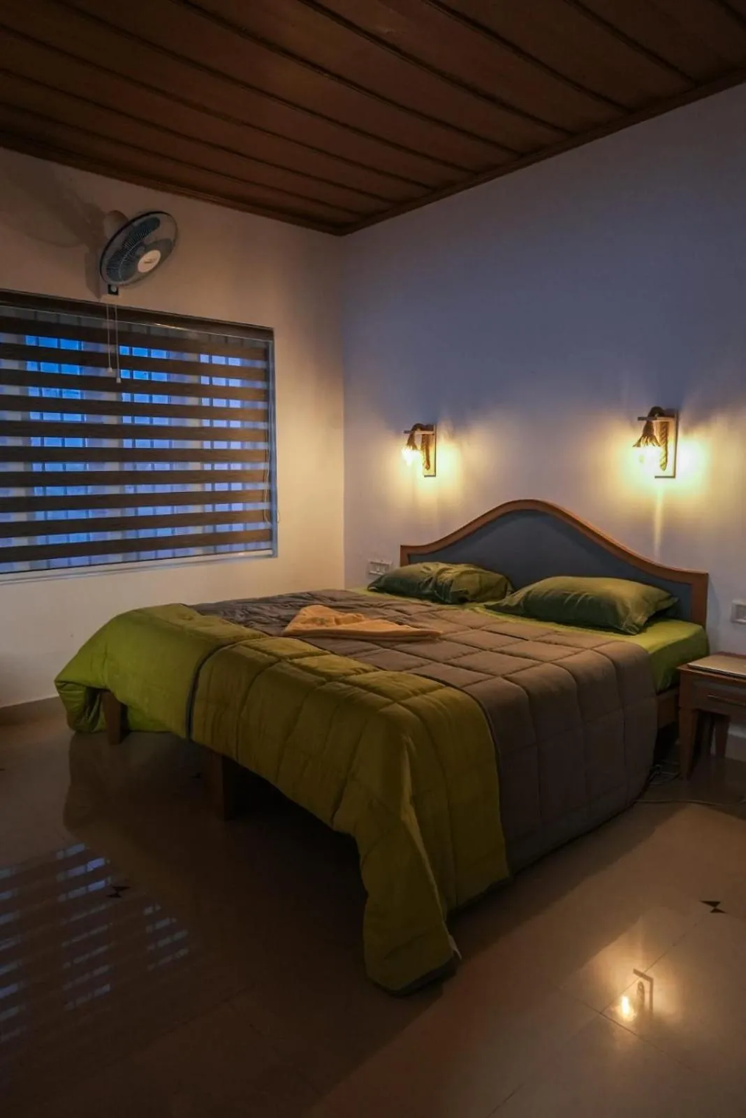 Bed in The Nirvana Resort Munnar