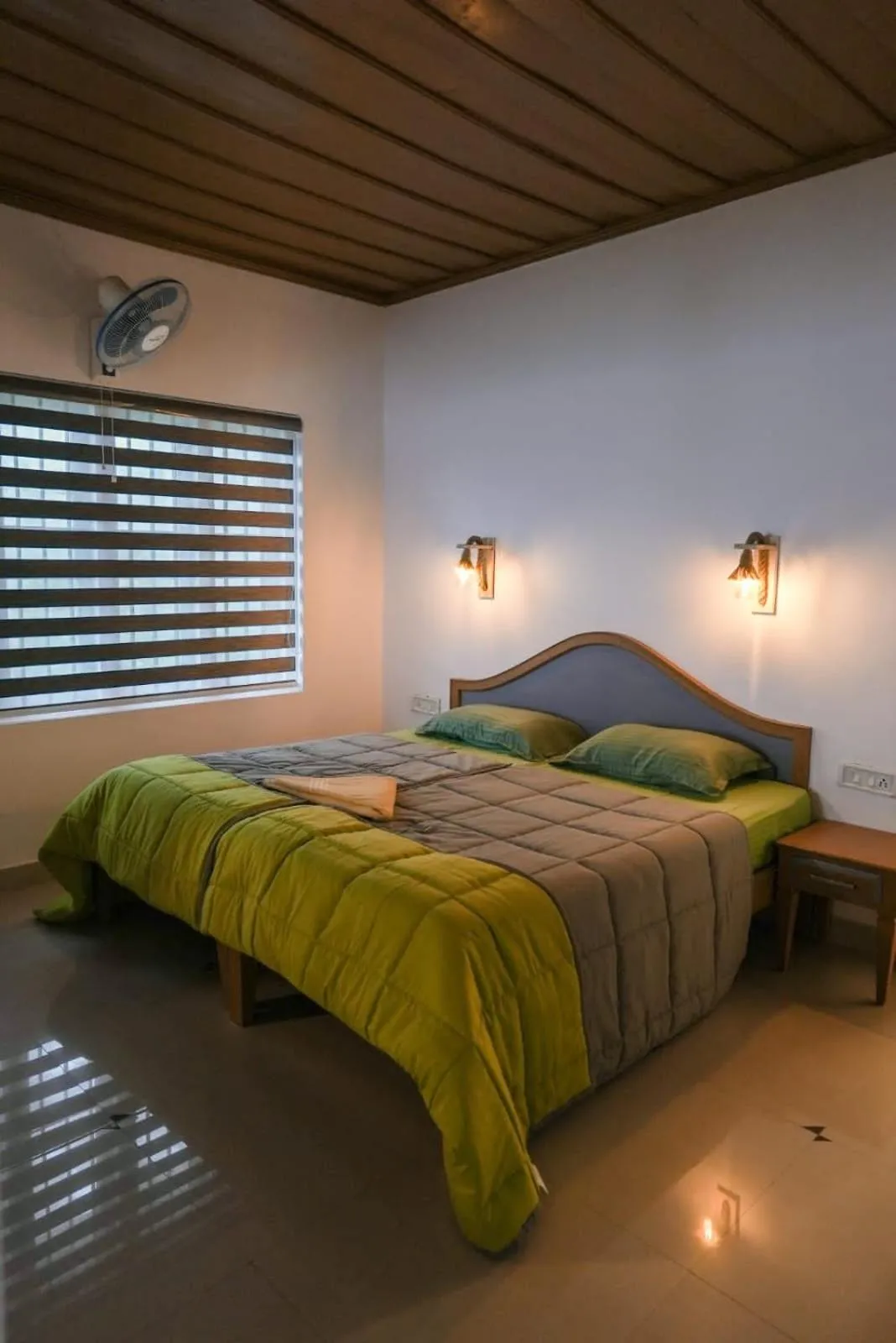 Bed in The Nirvana Resort Munnar