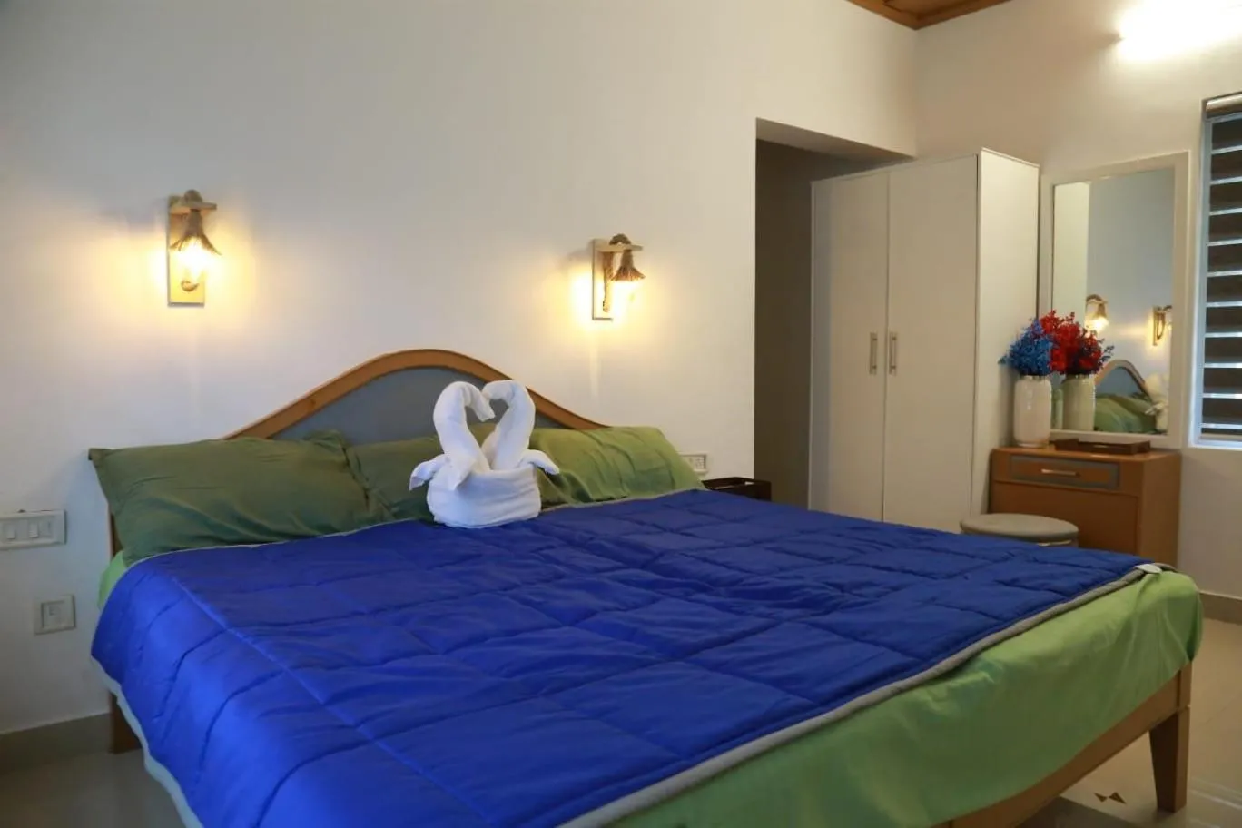 Bed in The Nirvana Resort Munnar