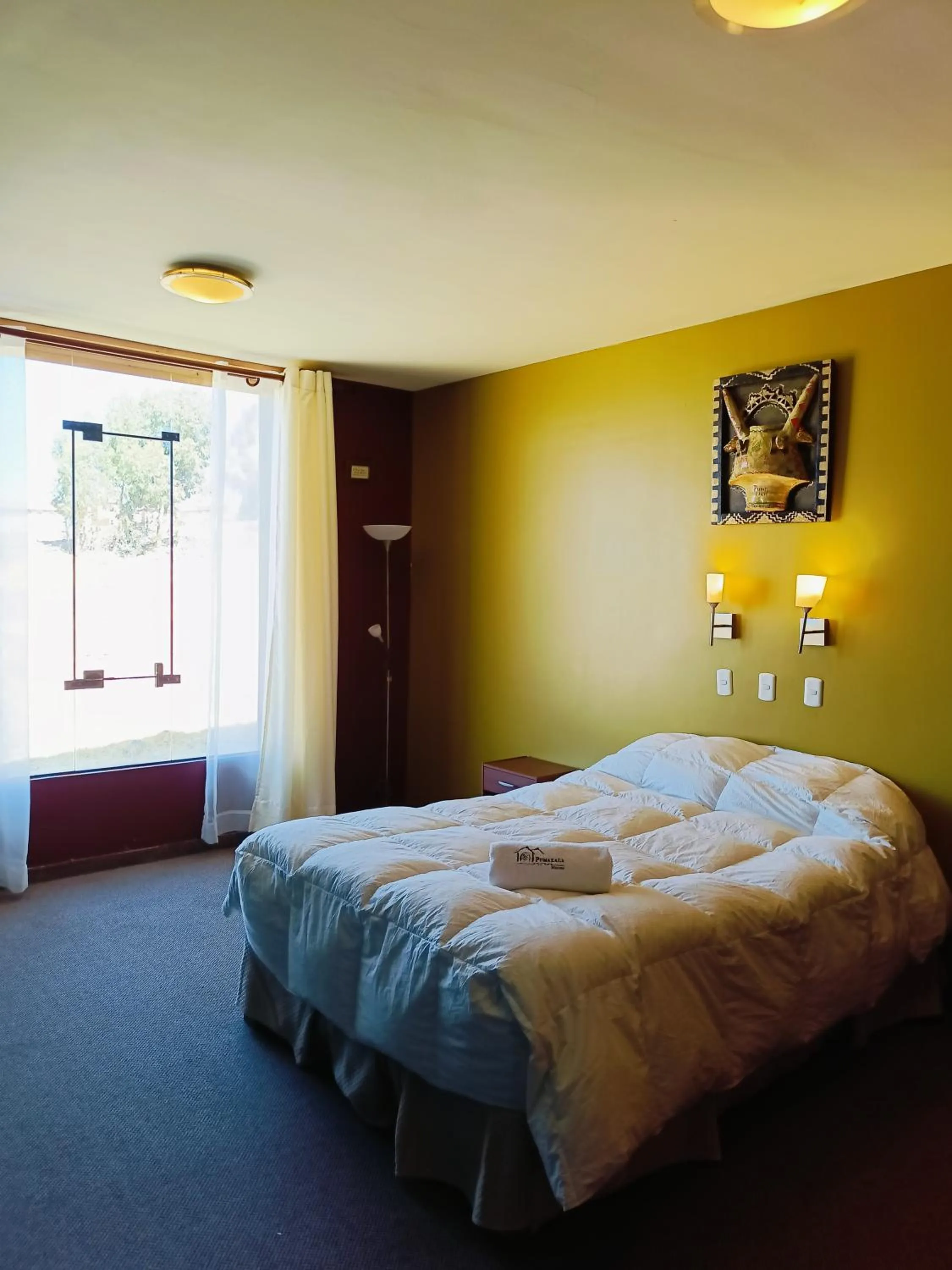 Bed in Hotel Pumakala