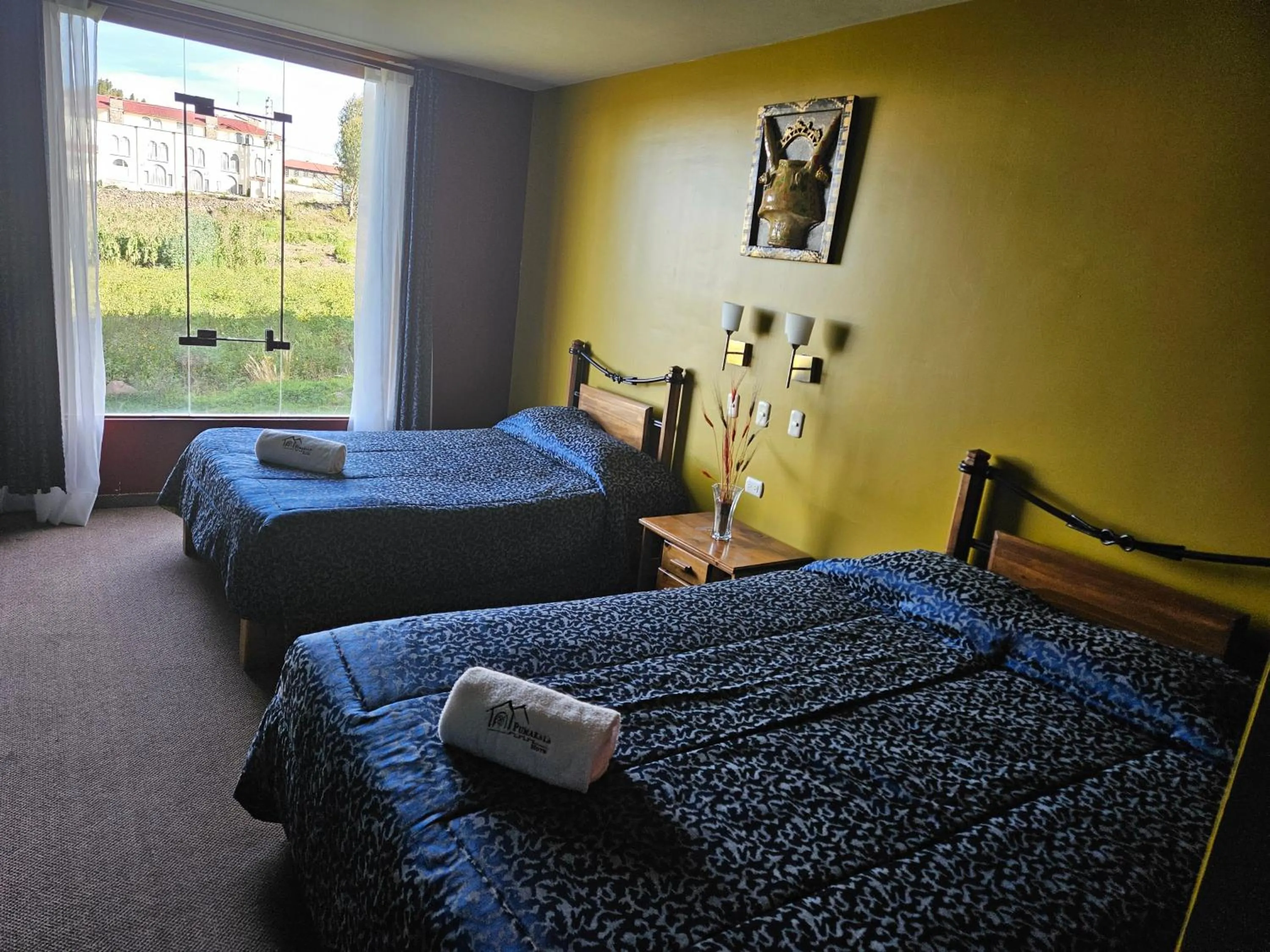 Bed in Hotel Pumakala