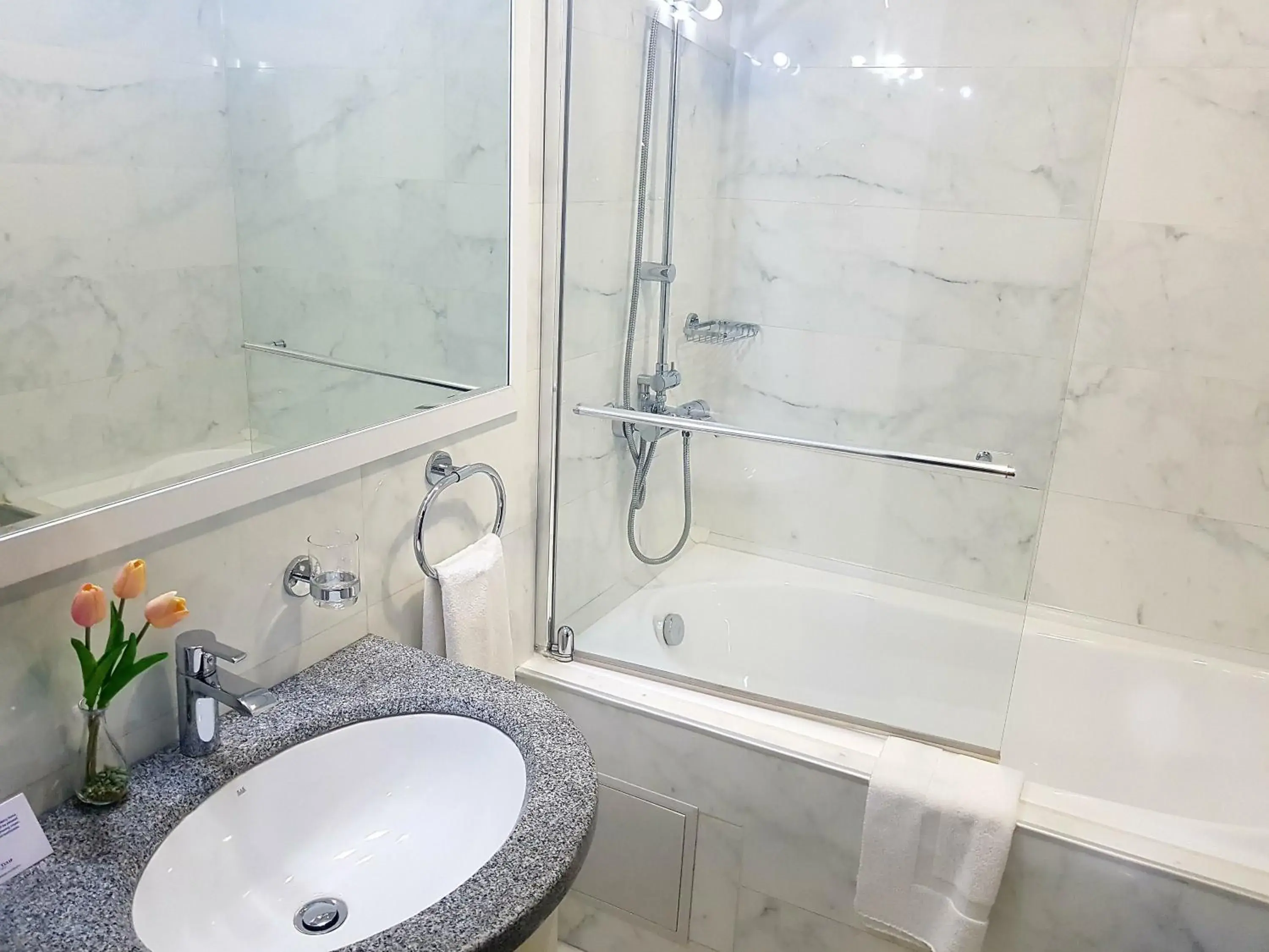 Bathroom in Ramada by Wyndham Bishkek Centre Bathroom in Ramada by Wyndham Bishkek Centre