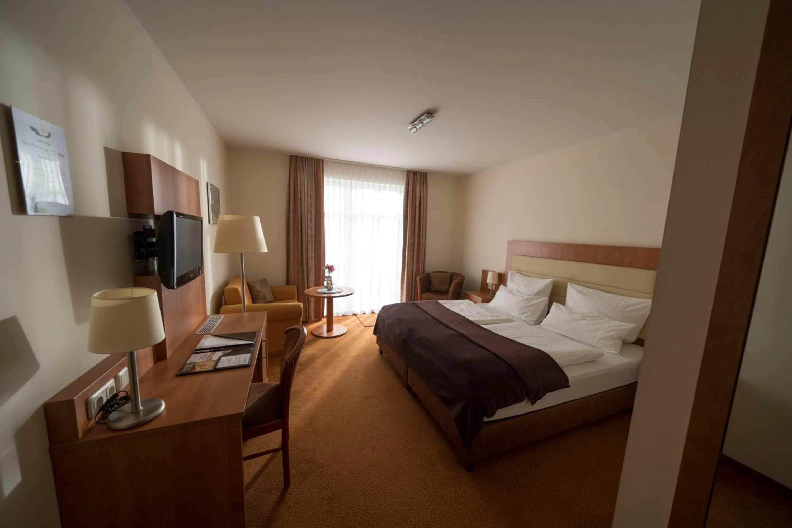 Photo of the whole room, Bed in Hotel & Café Strandeck