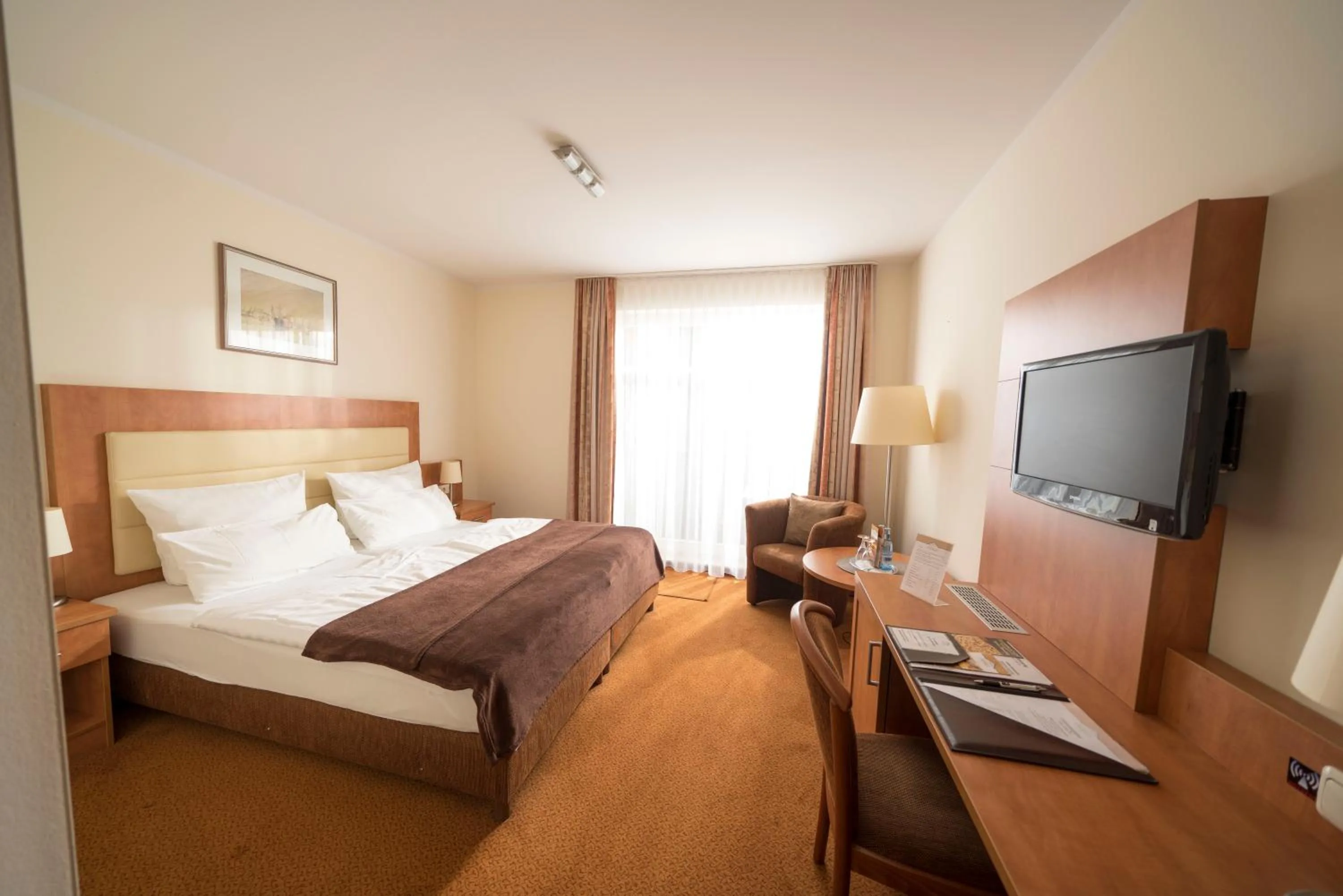 Photo of the whole room, Bed in Hotel & Café Strandeck