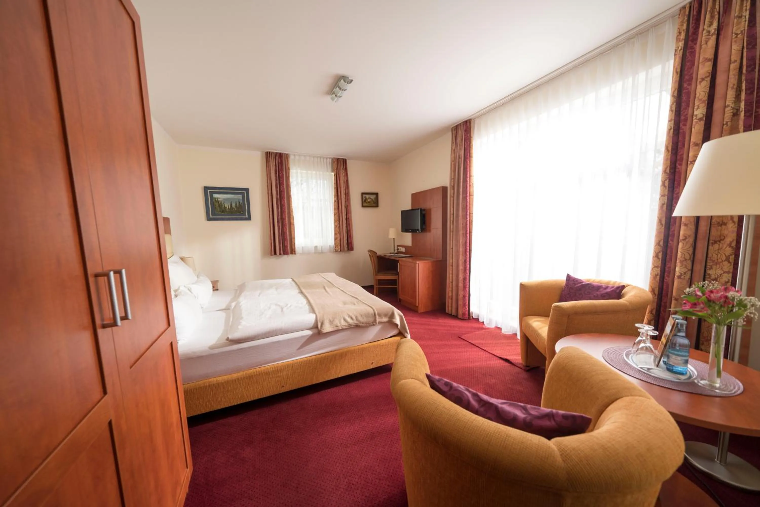 Photo of the whole room, Bed in Hotel & Café Strandeck