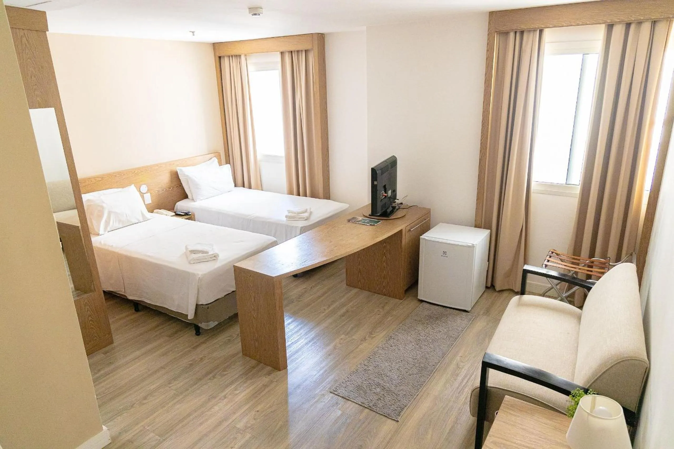 Seating area, Bed in Elegant Flat Paulista Alameda Campinas Garagem , Pool, Ar Cod,