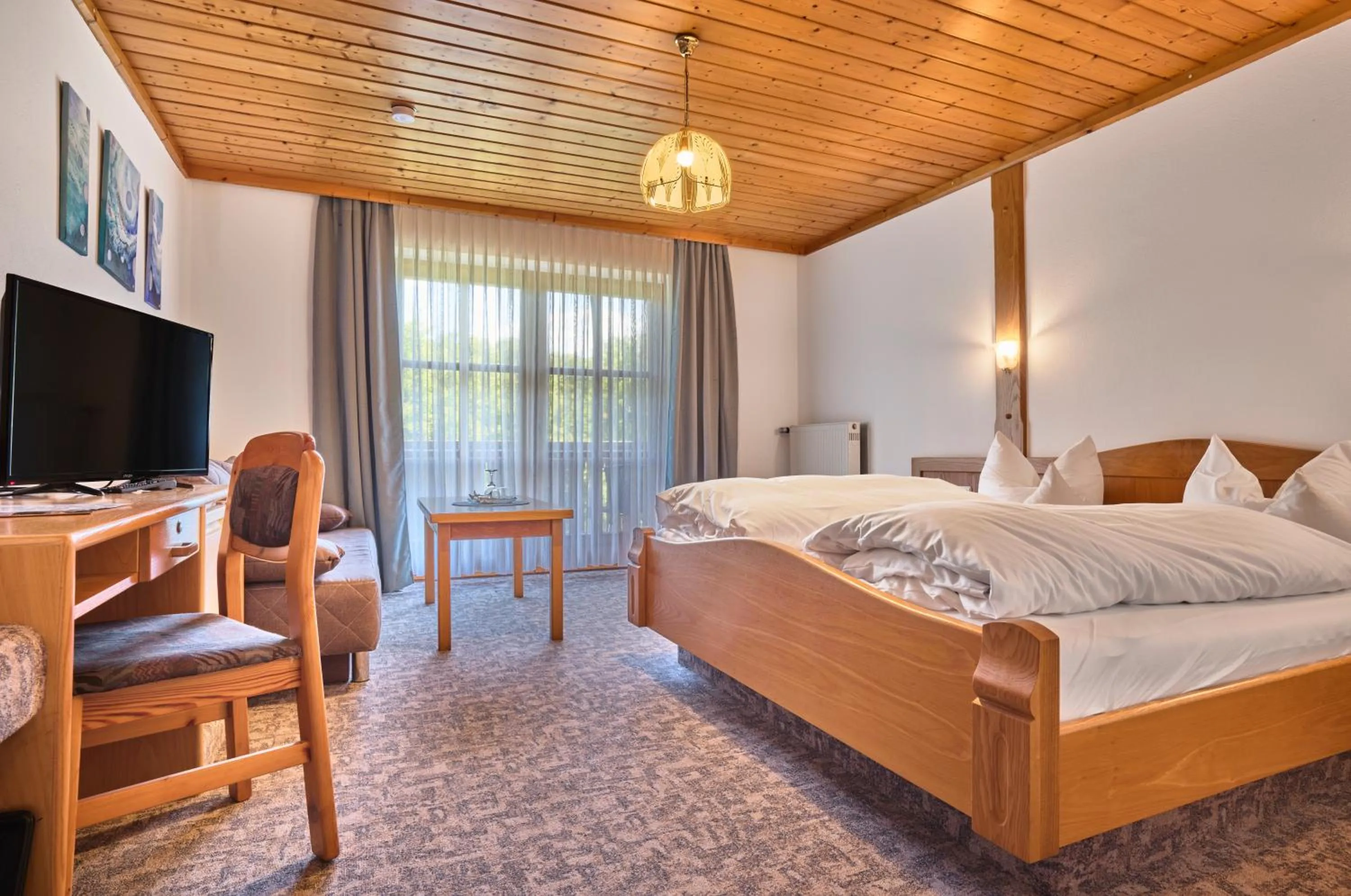 Photo of the whole room, Bed in Gasthof Pension Fischerstüberl