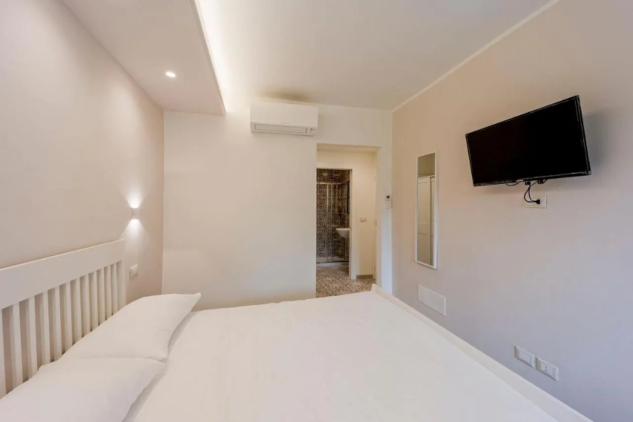 Bed in Gli Ulivi Rooms And Breakfast