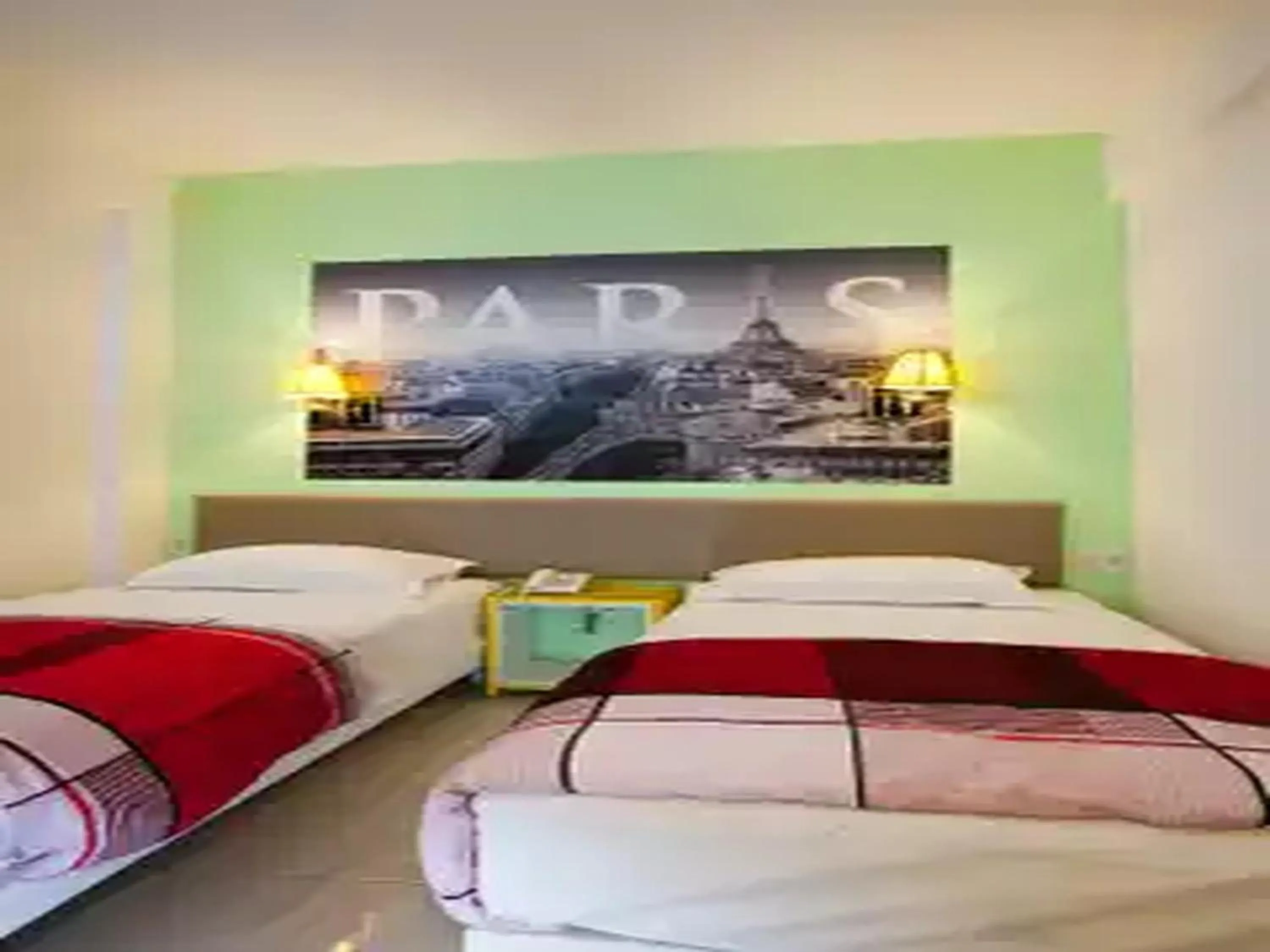 Bed in Dewarna Hotel Arifin