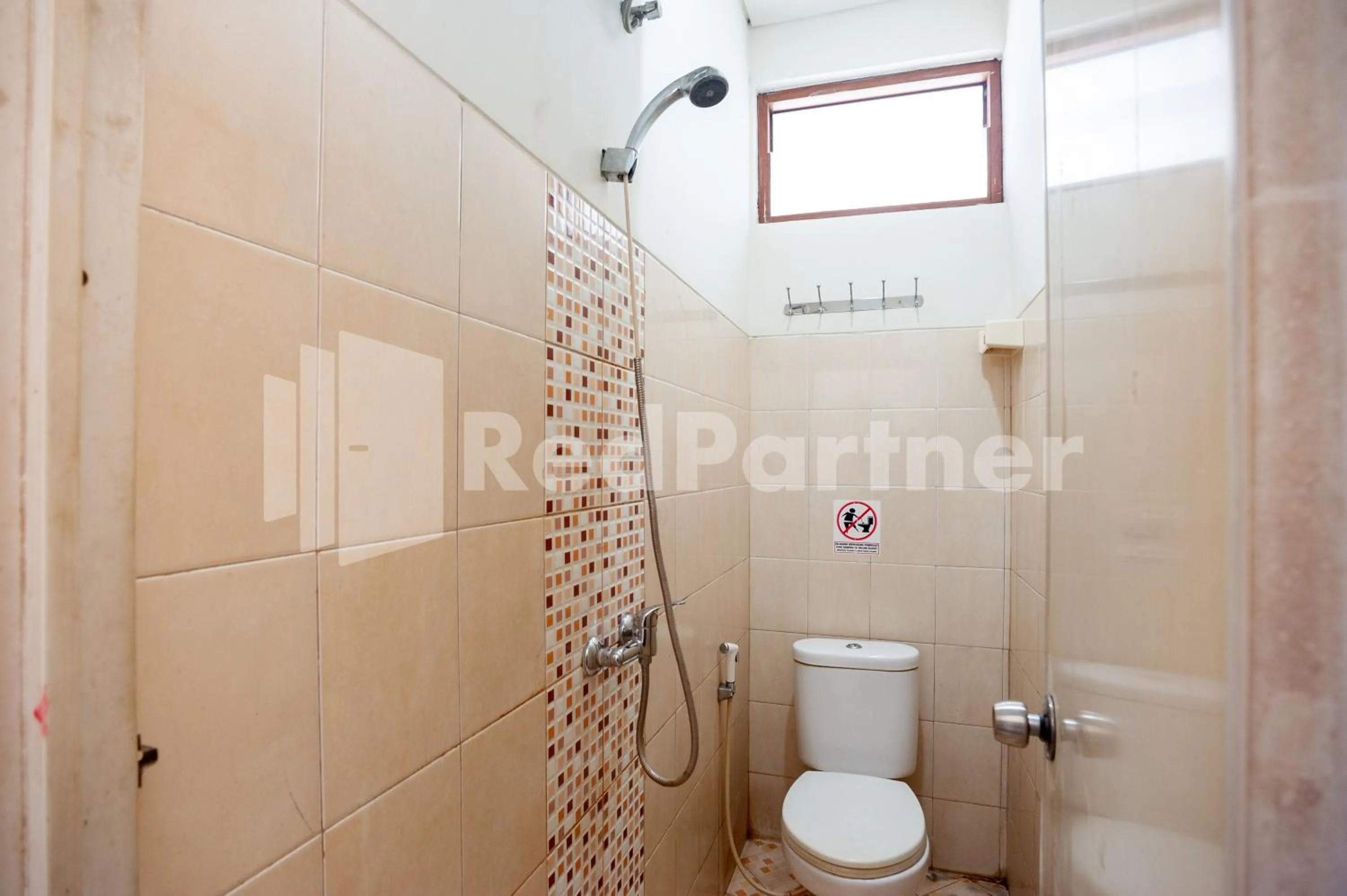 Bathroom in One 2 Residence near Slipi Jaya Mall Mitra RedDoorz