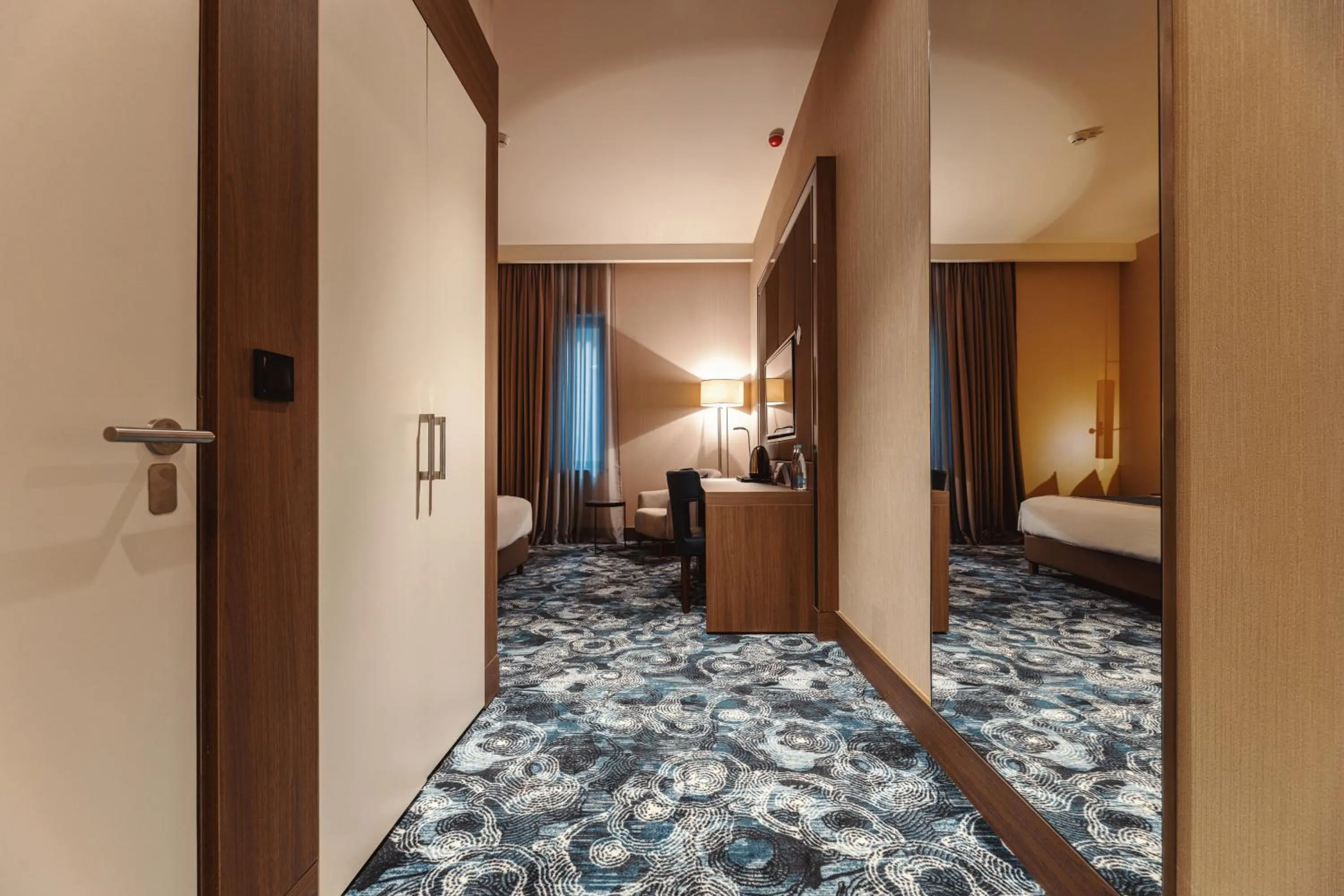 Bed in Tbilisi Philharmonic Hotel by Mercure