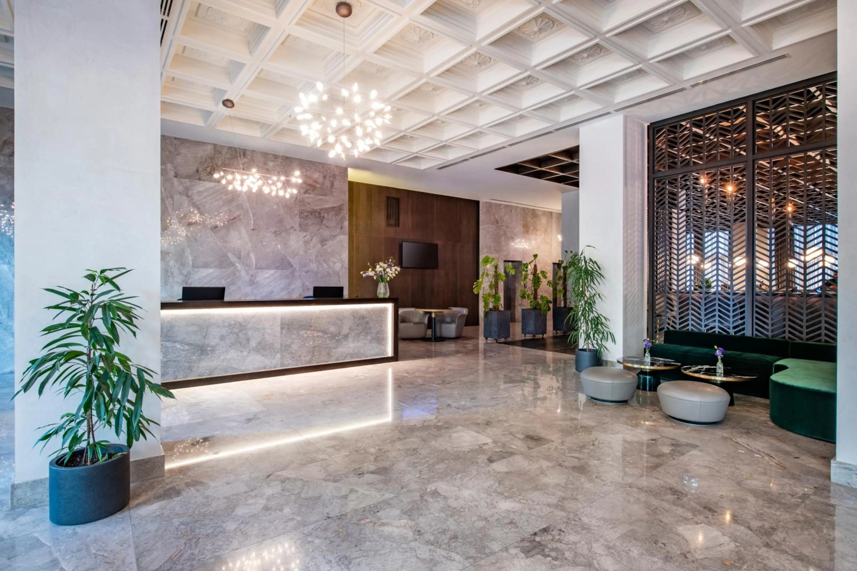 Lobby or reception in Tbilisi Philharmonic Hotel by Mercure