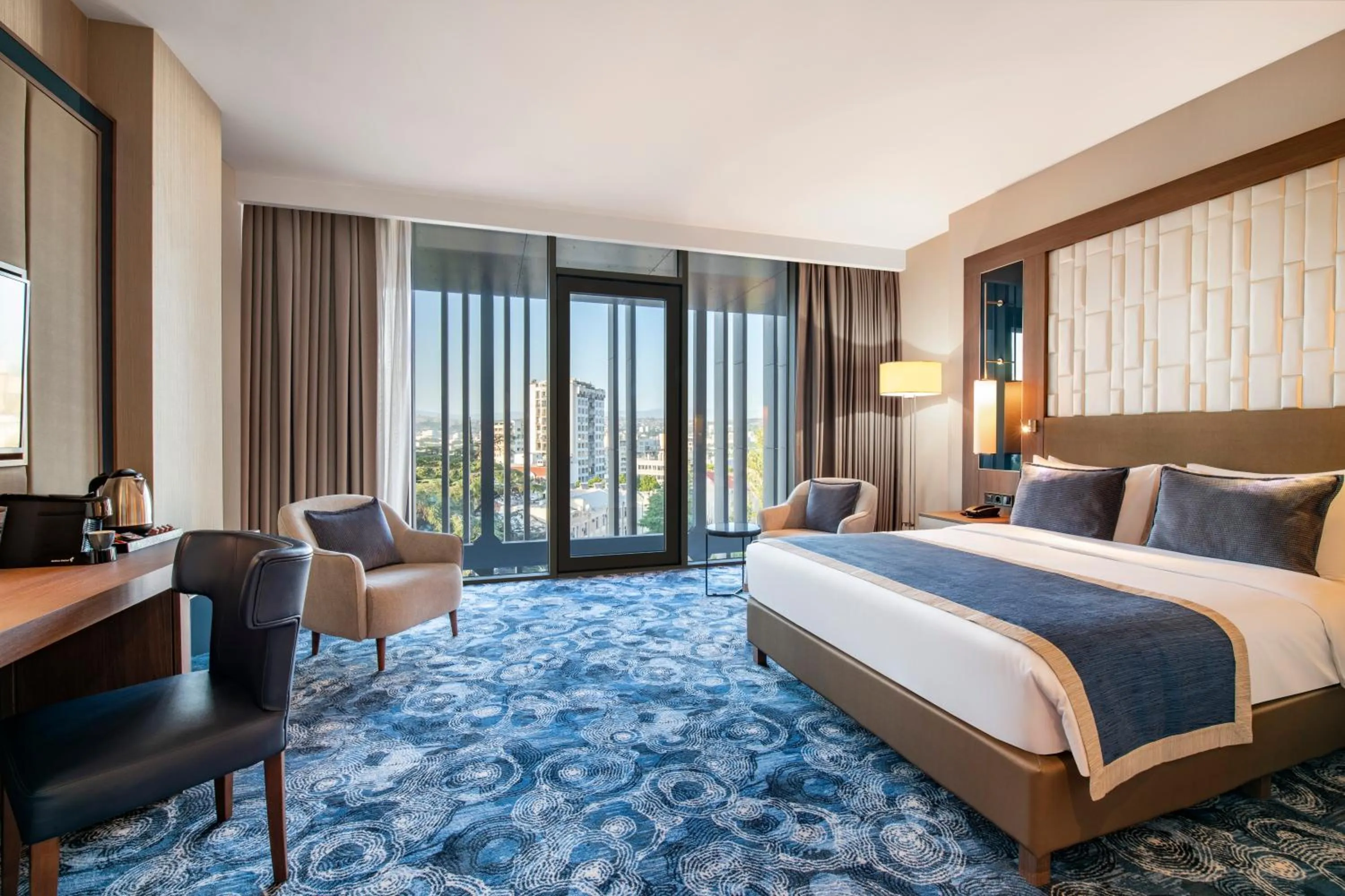 Bed in Tbilisi Philharmonic Hotel by Mercure