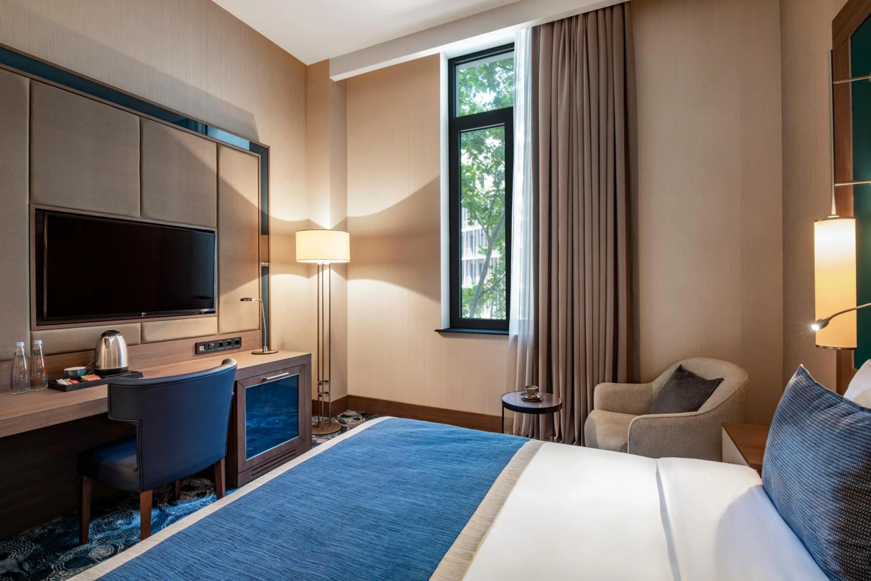 Seating area, Bed in Tbilisi Philharmonic Hotel by Mercure