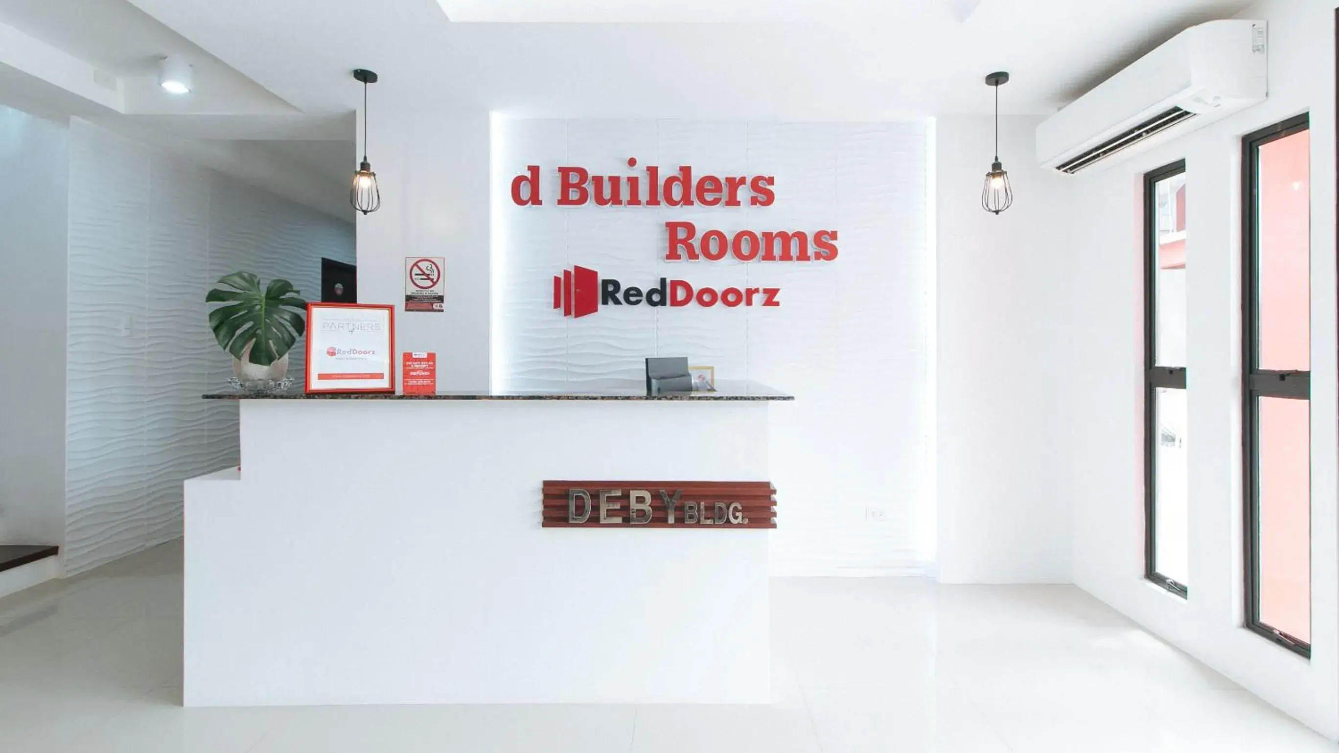 Lobby or reception in RedDoorz Plus at DBuilders Poblacion BGC Lobby or reception in RedDoorz Plus at DBuilders Poblacion BGC