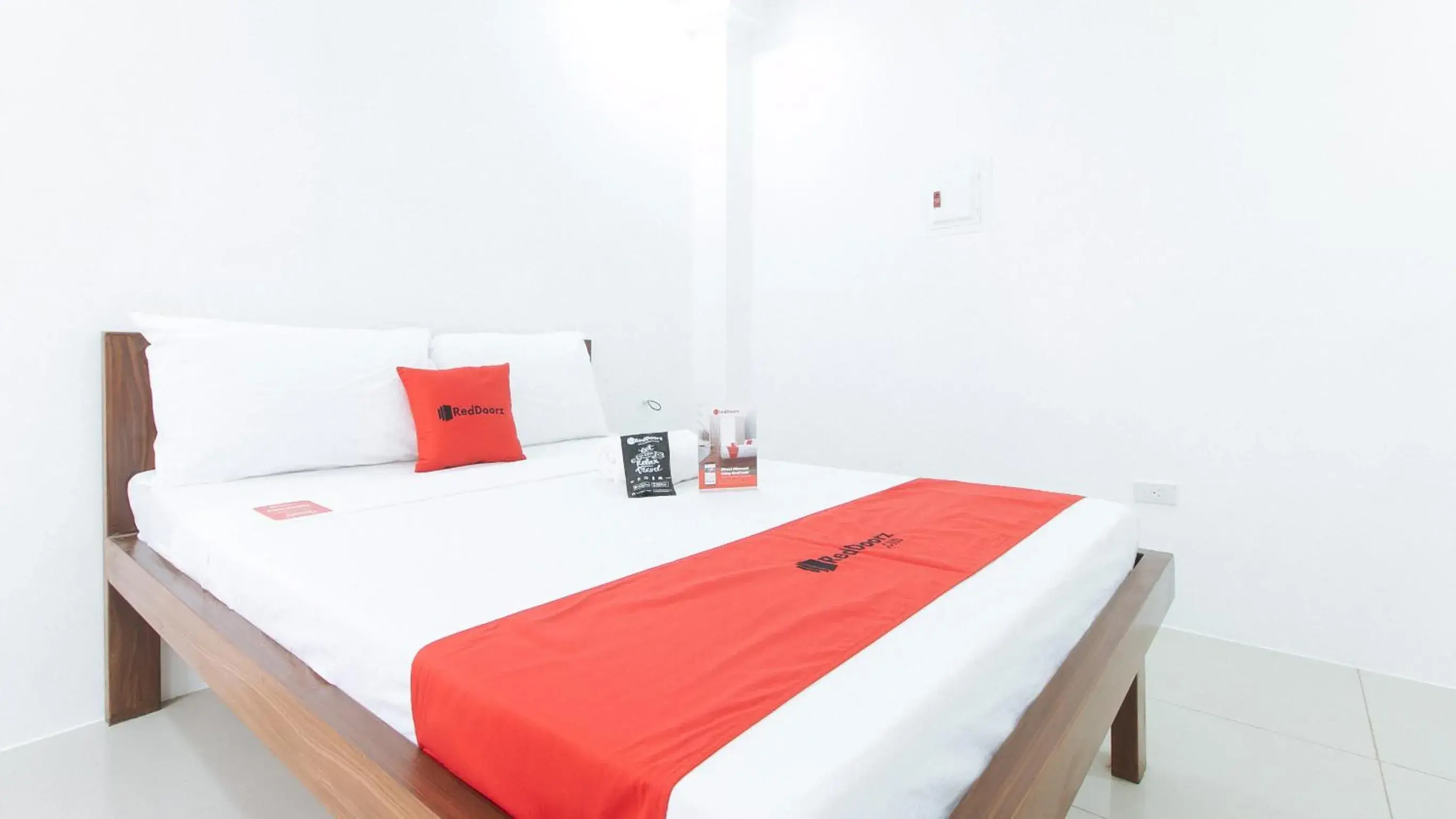 Bed in RedDoorz Plus at DBuilders Poblacion BGC Bed in RedDoorz Plus at DBuilders Poblacion BGC
