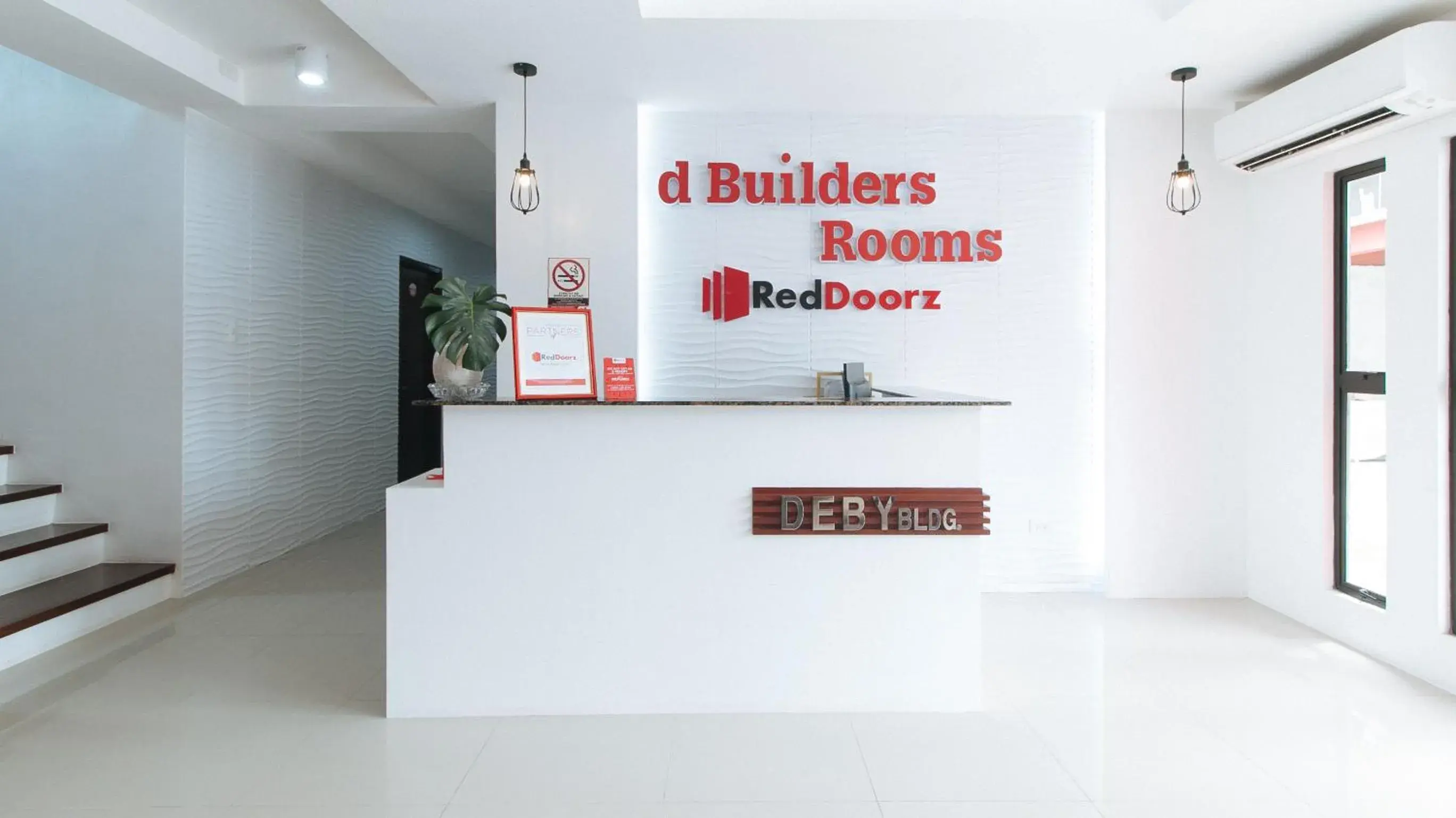 Lobby or reception in RedDoorz Plus at DBuilders Poblacion BGC Lobby or reception in RedDoorz Plus at DBuilders Poblacion BGC