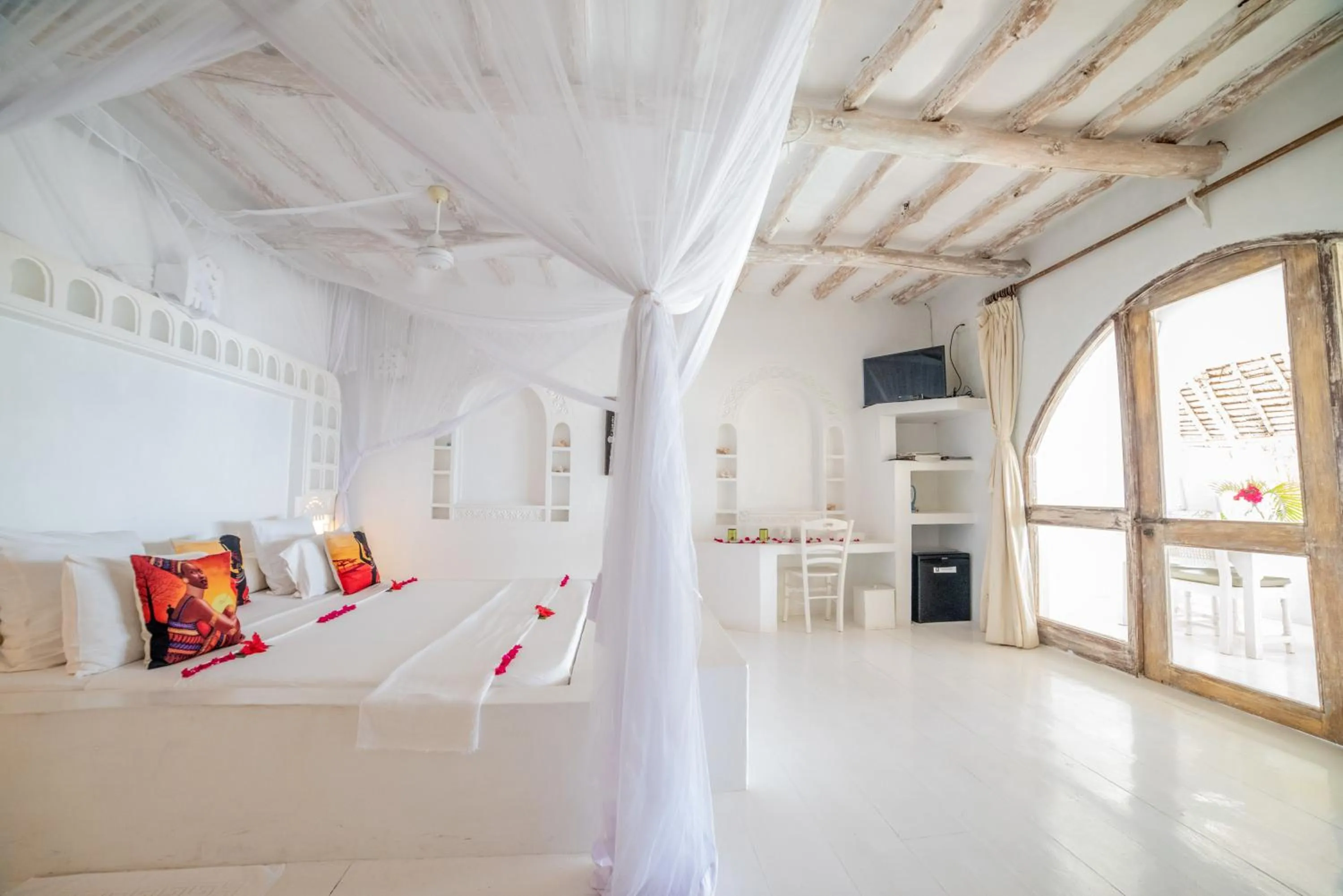 Photo of the whole room, Bed in Msambweni Beach House and Private Villas