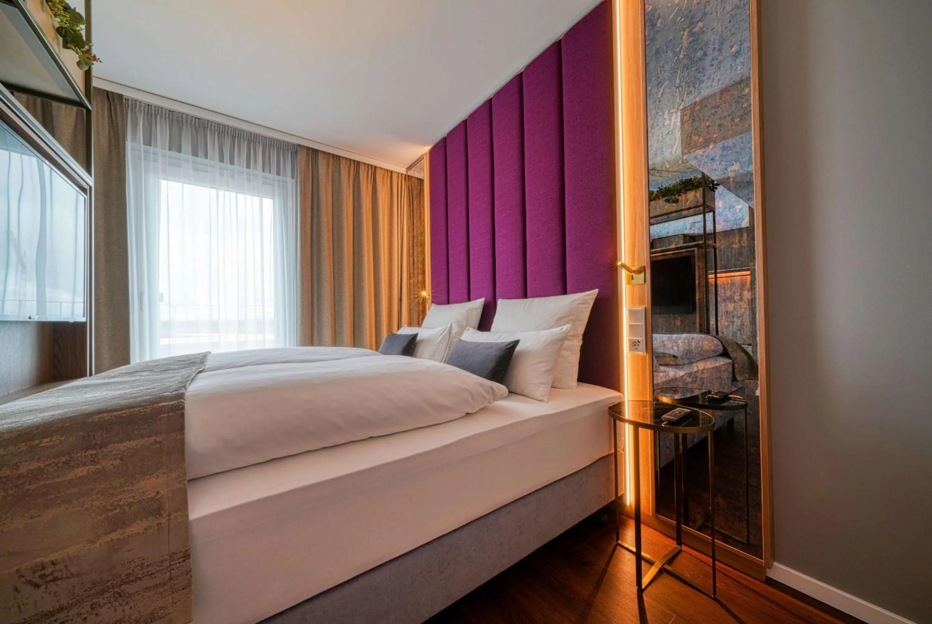 Photo of the whole room, Bed in FourSide Hotel Ringsheim, Trademark Collection by Wyndham