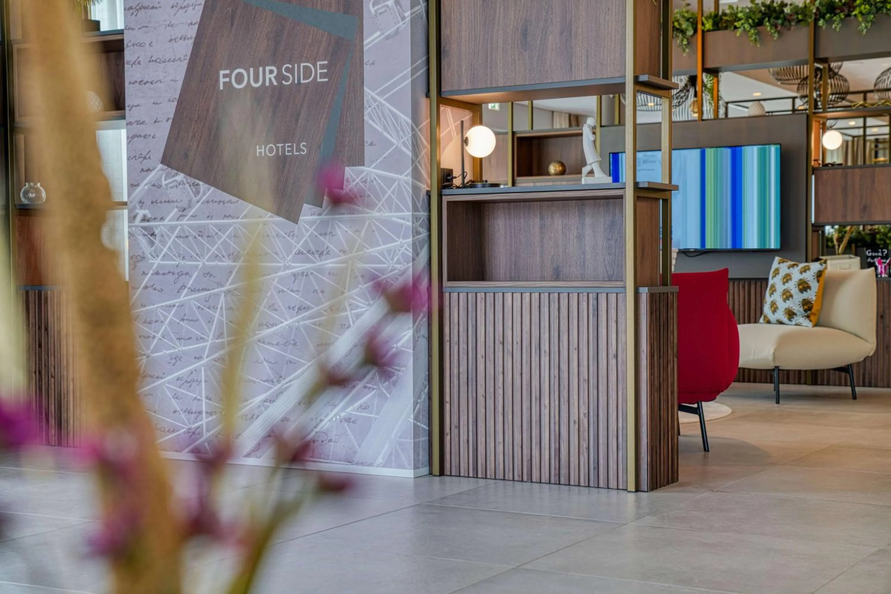 Lobby or reception in FourSide Hotel Ringsheim, Trademark Collection by Wyndham