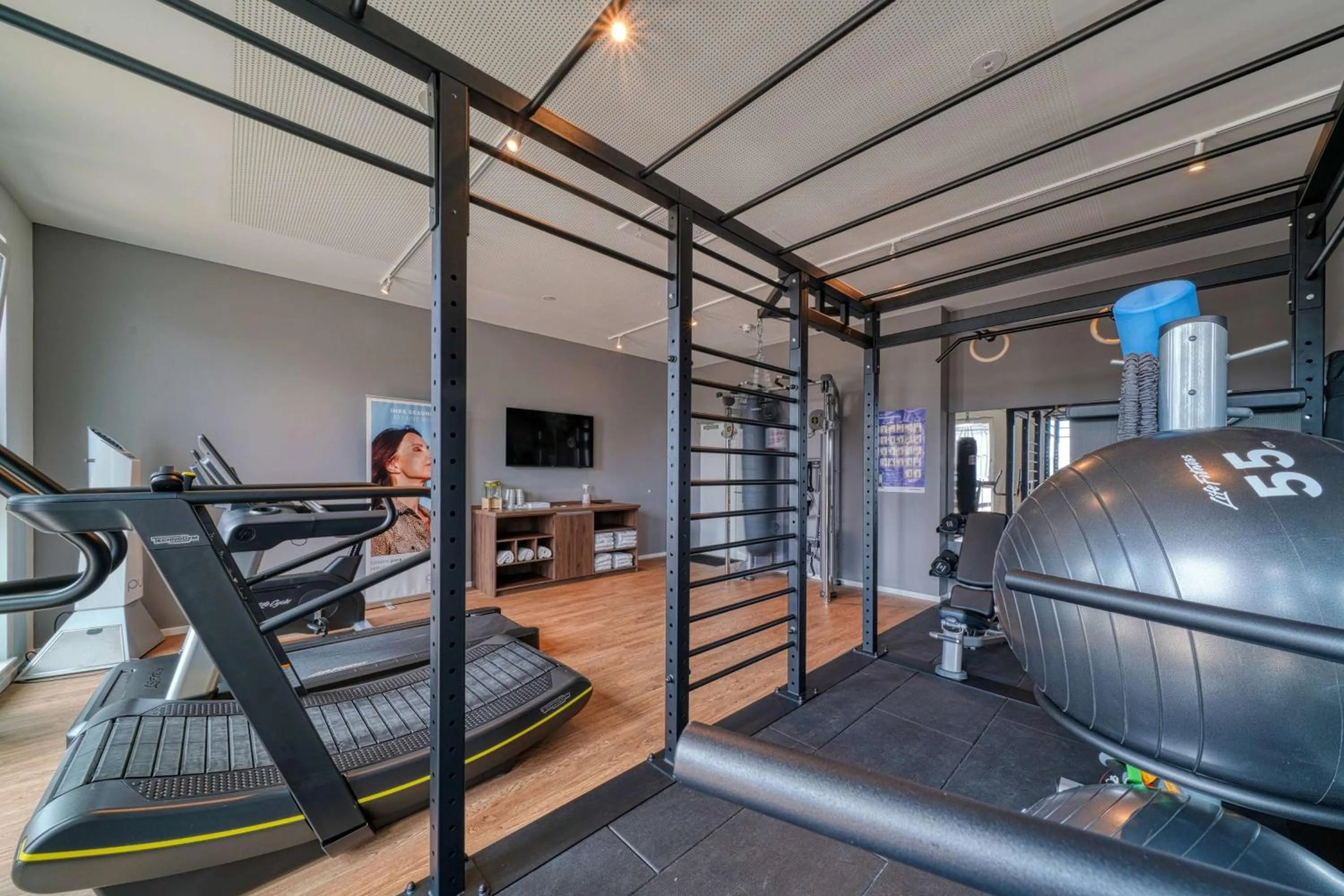 Fitness centre/facilities in FourSide Hotel Ringsheim, Trademark Collection by Wyndham