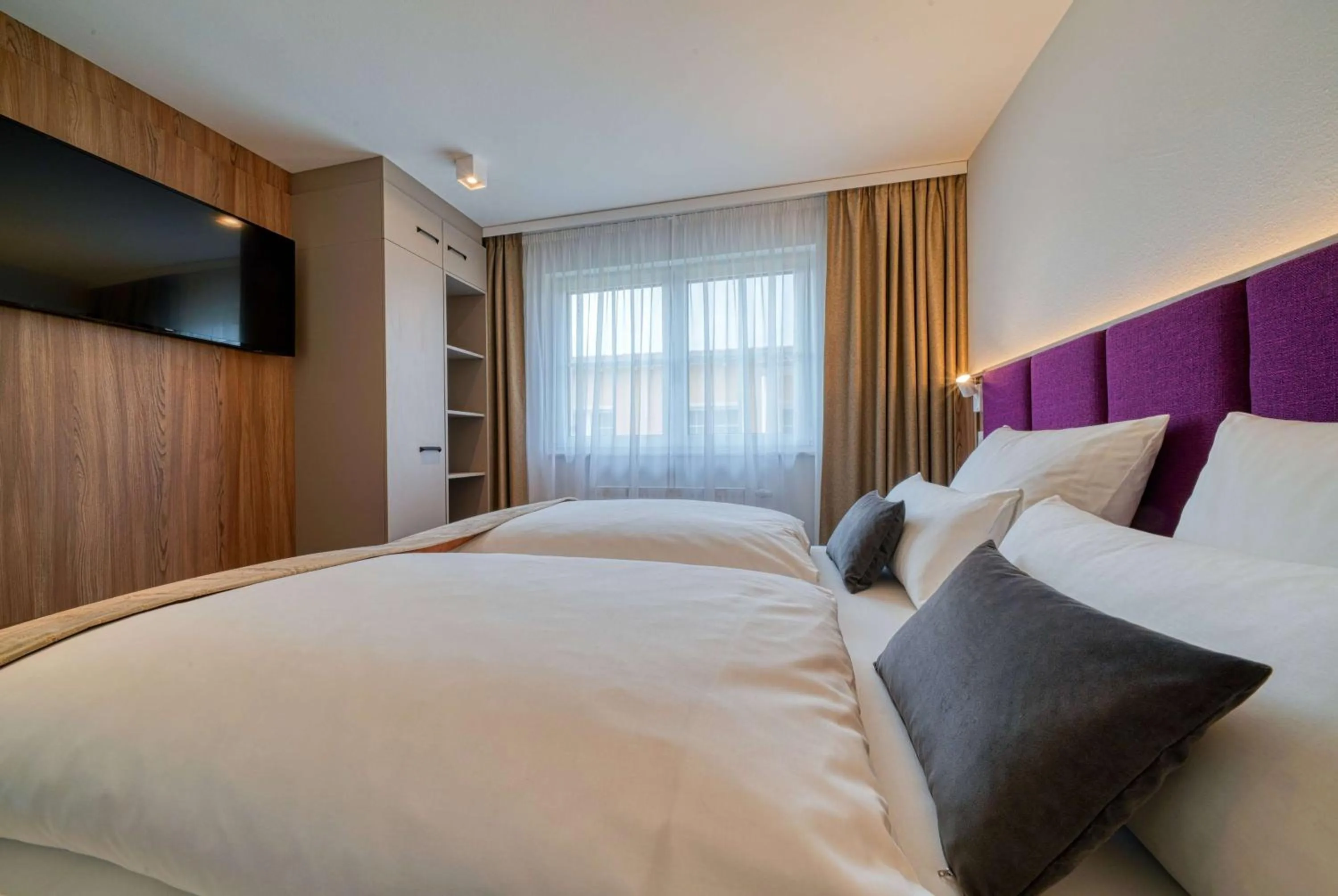 Photo of the whole room, Bed in FourSide Hotel Ringsheim, Trademark Collection by Wyndham