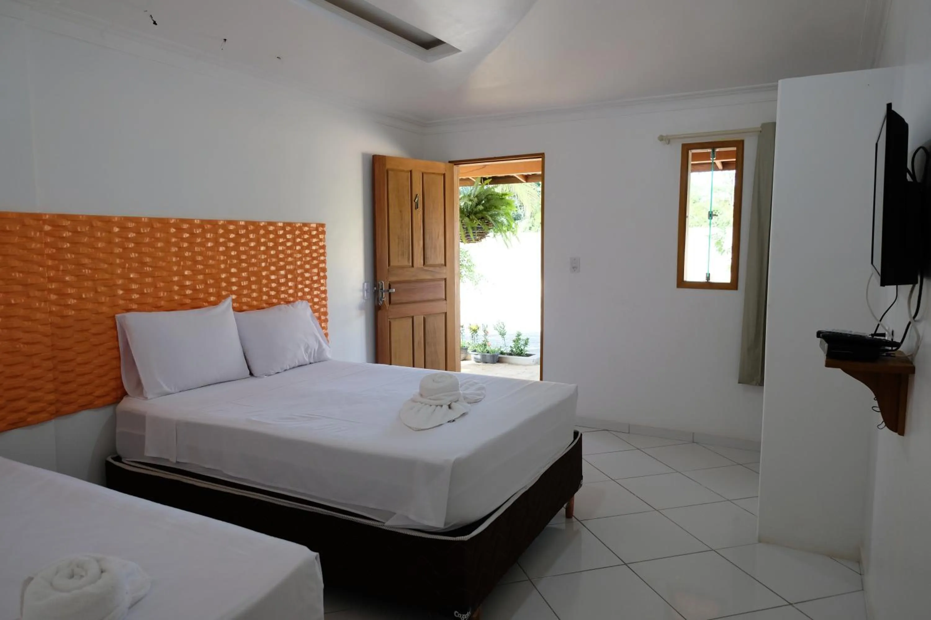 Bed in Pousada Casa Grande