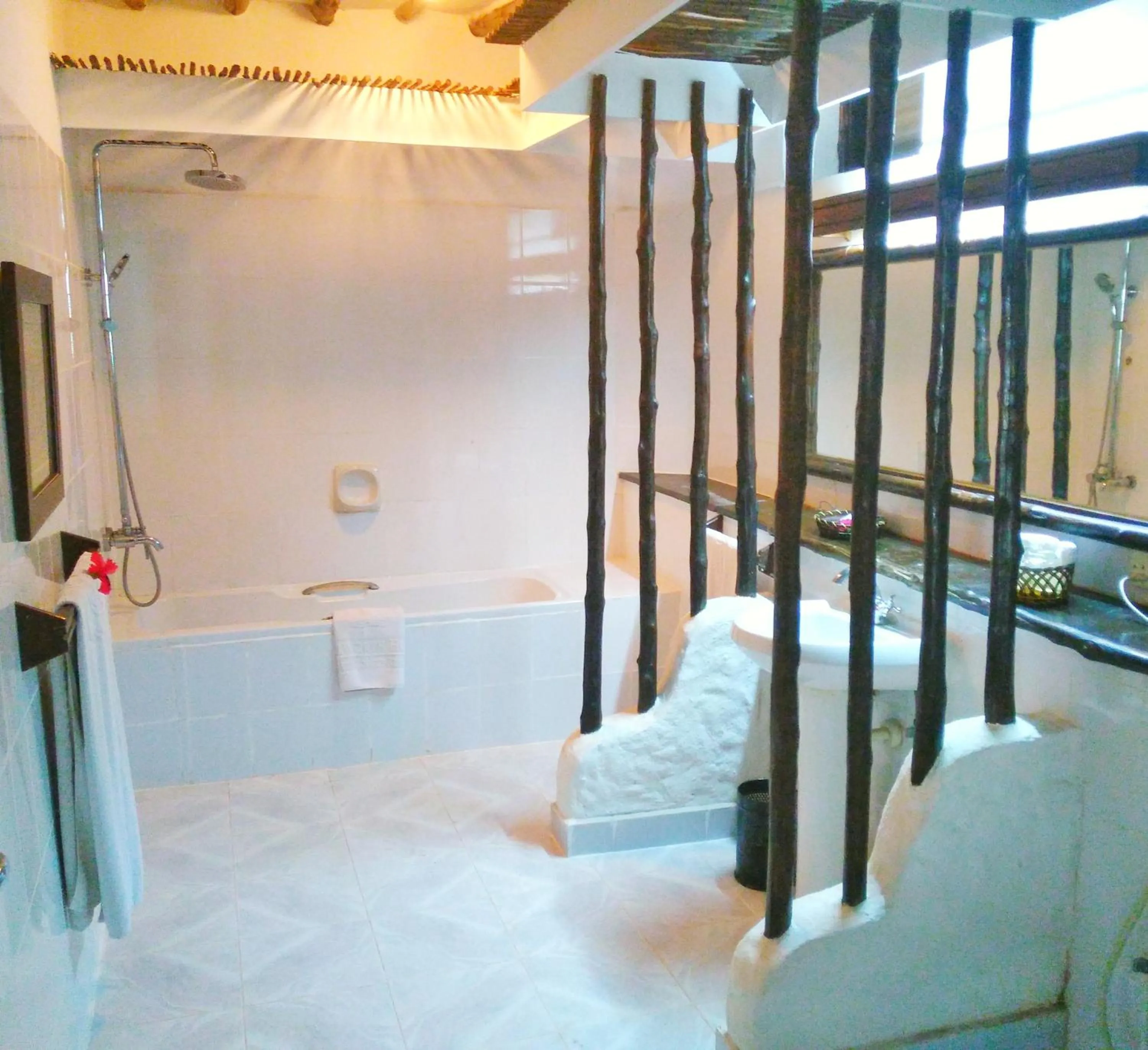 Bathroom, Bed in Zanzibar Beach Resort