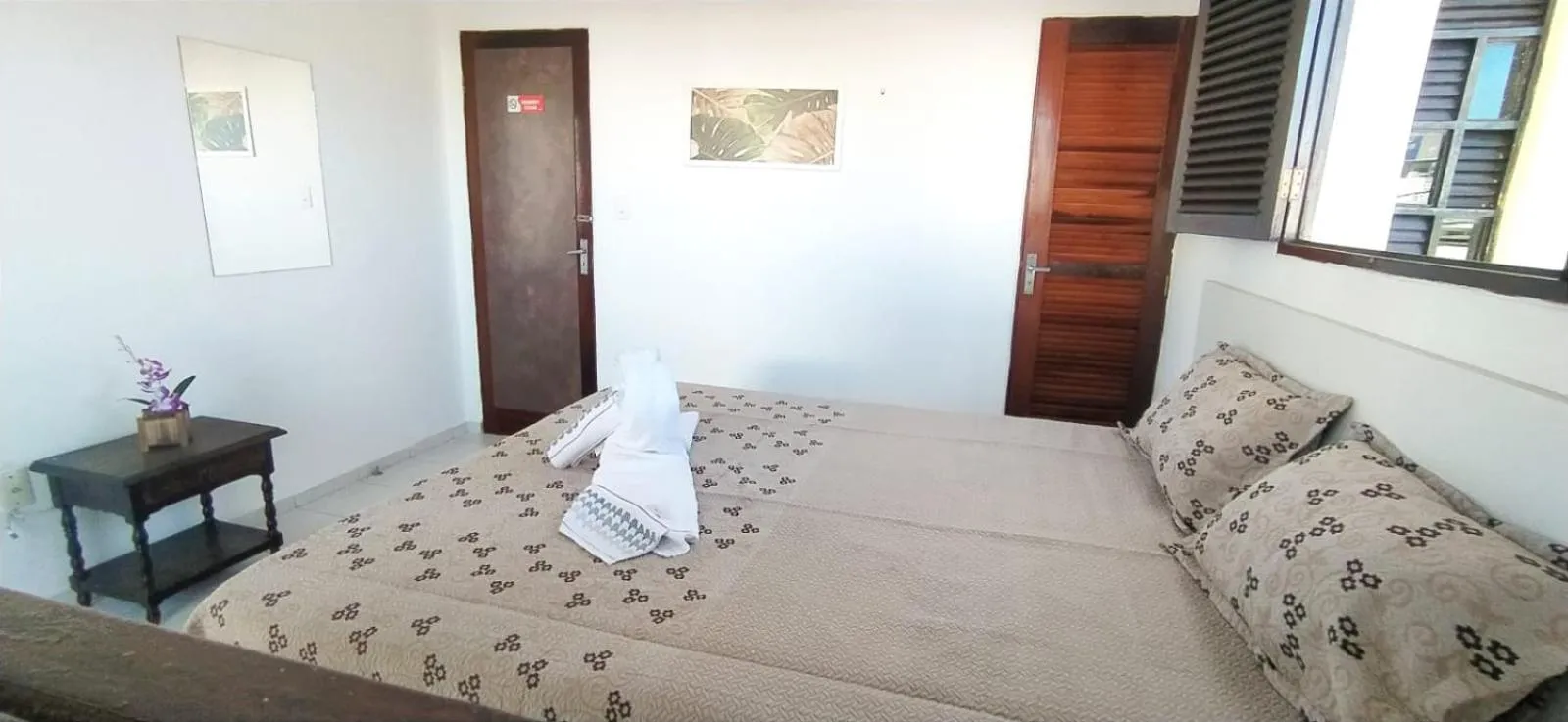 Bed in POUSADA VENTO NORTE CAMA & CAFÉ SUÍTES INDIVIDUAIs