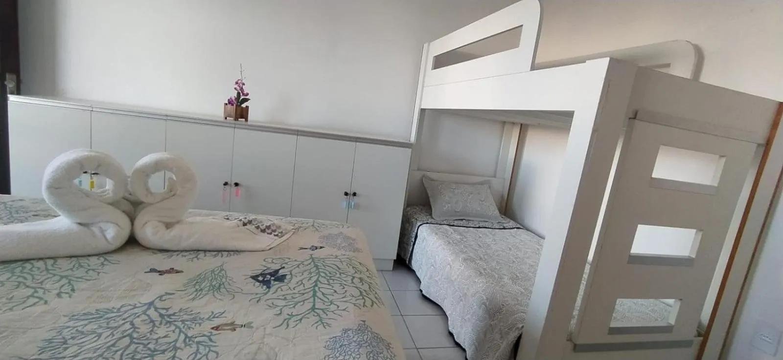 Bed in POUSADA VENTO NORTE CAMA & CAFÉ SUÍTES INDIVIDUAIs