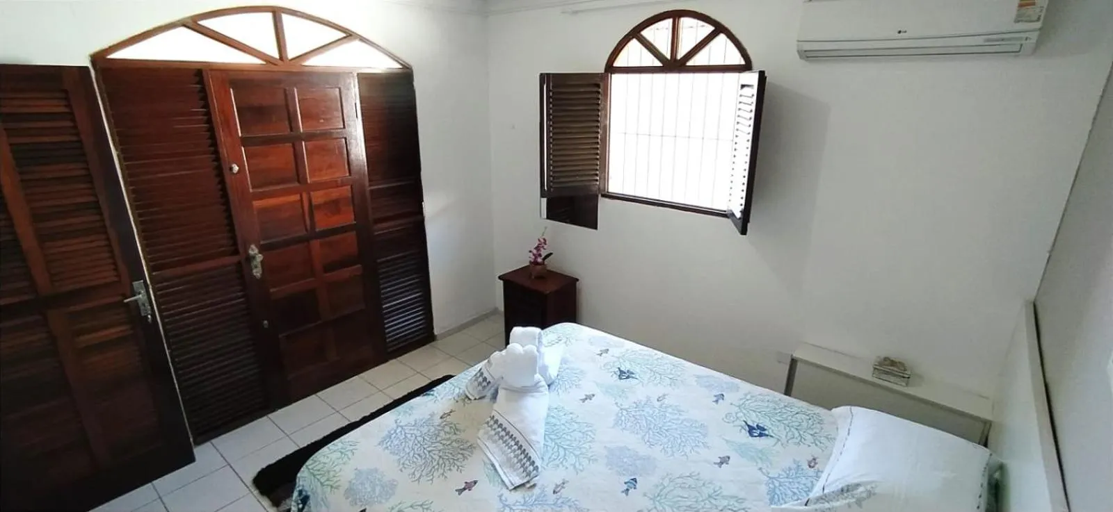 Bed in POUSADA VENTO NORTE CAMA & CAFÉ SUÍTES INDIVIDUAIs