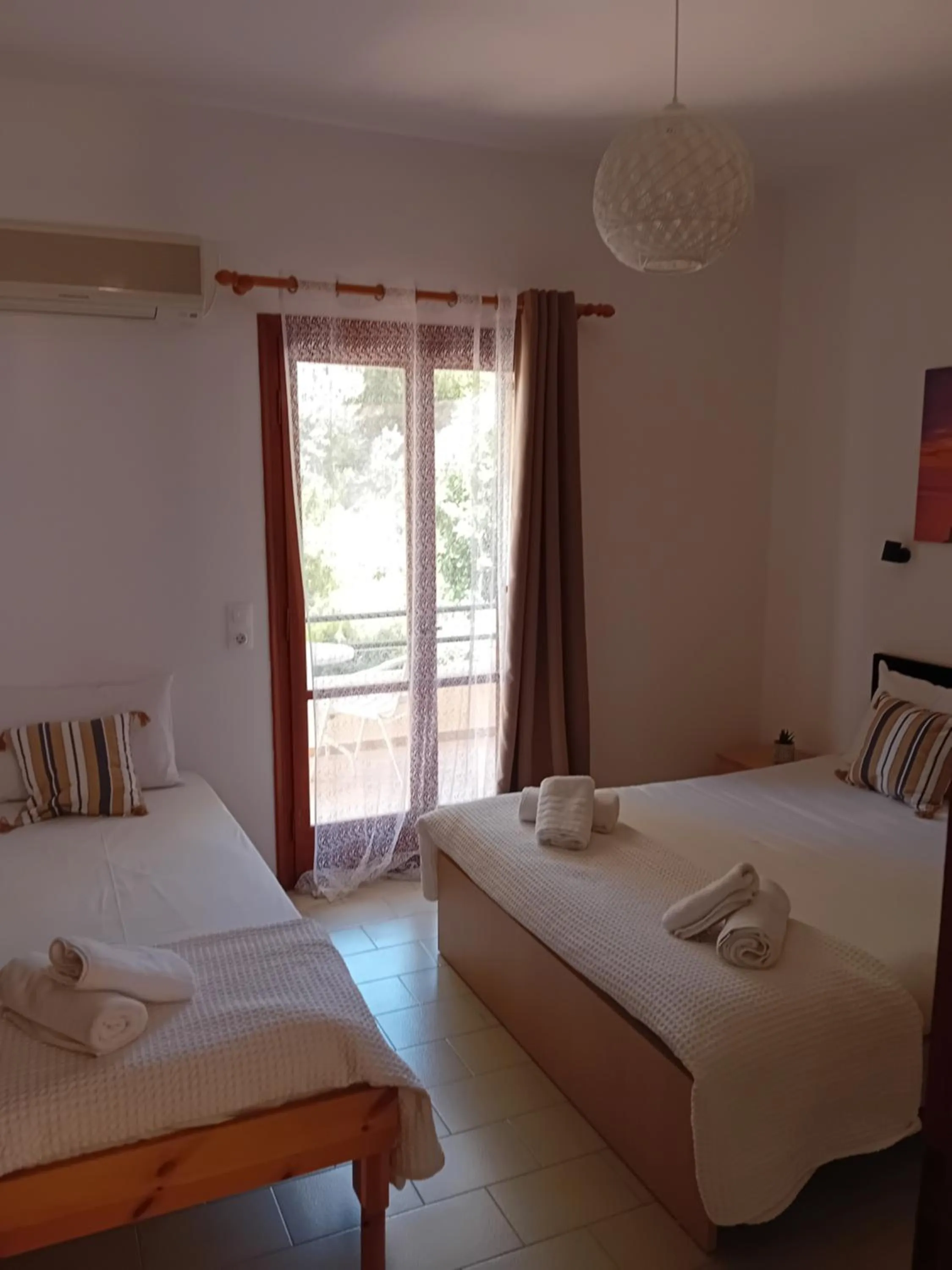 Bed in Φiloxenia Apartments