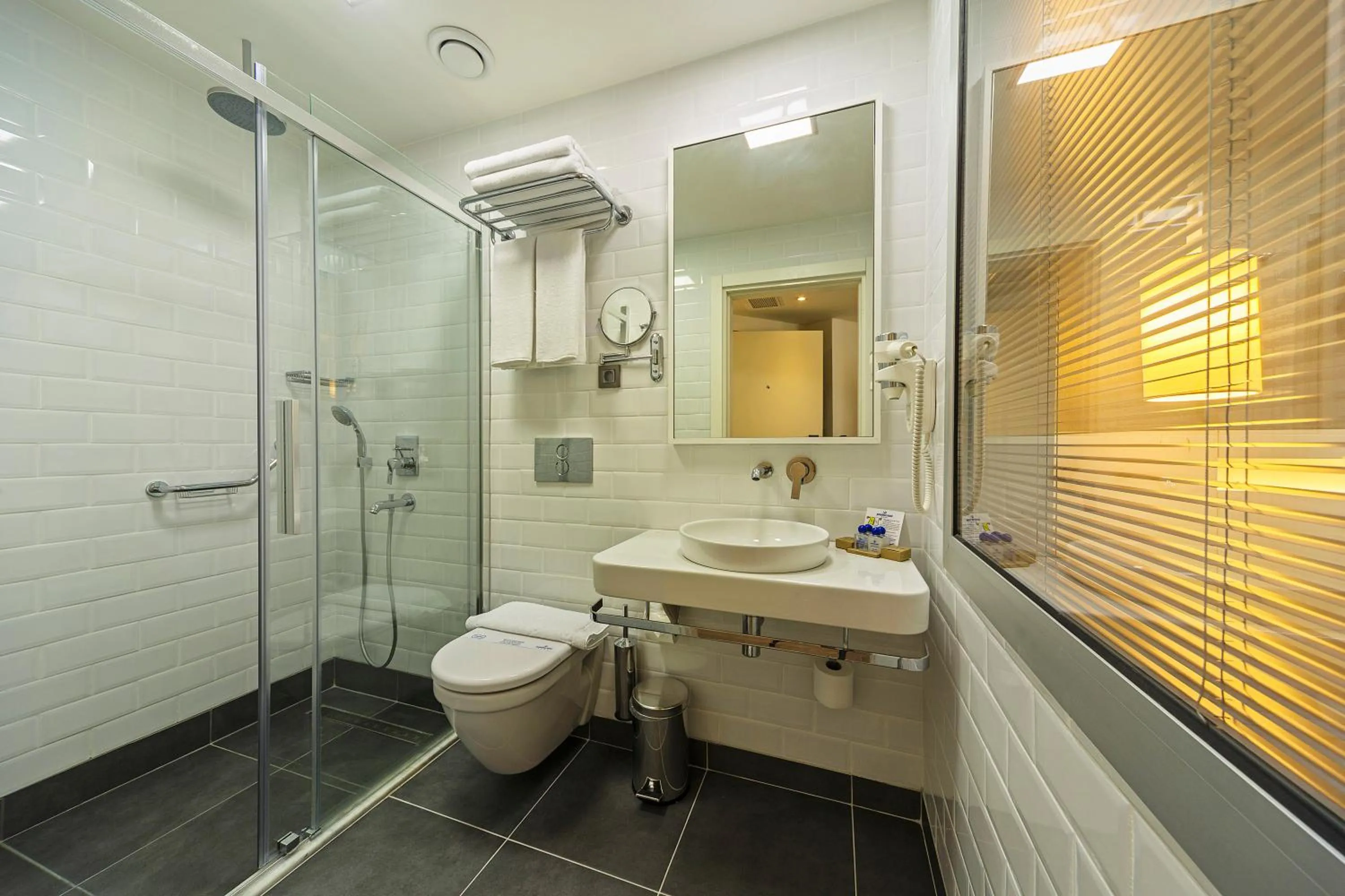 Bathroom in Poseidon Hotel - Adult Only