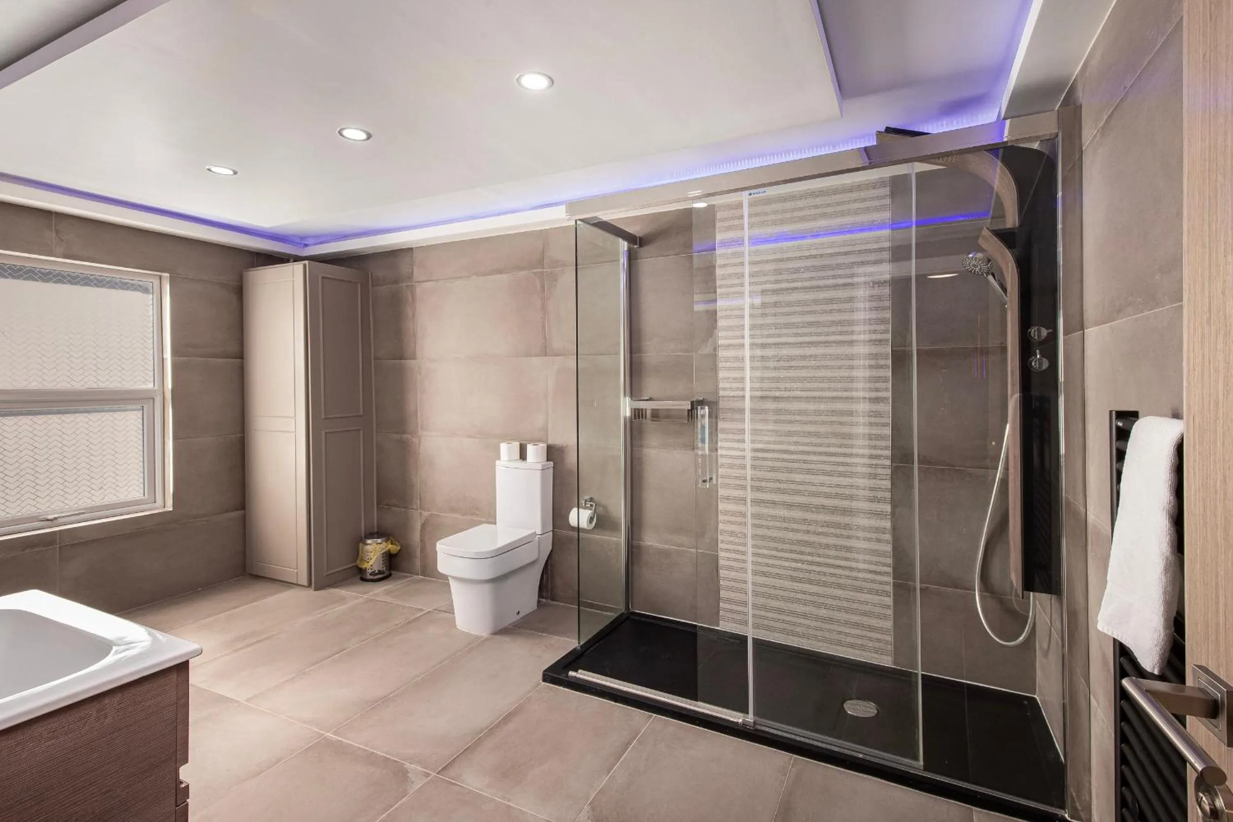 Bathroom in Town View Apartment by Sasco