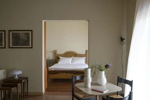Seating area, Bed in Annunciata Soul Retreat