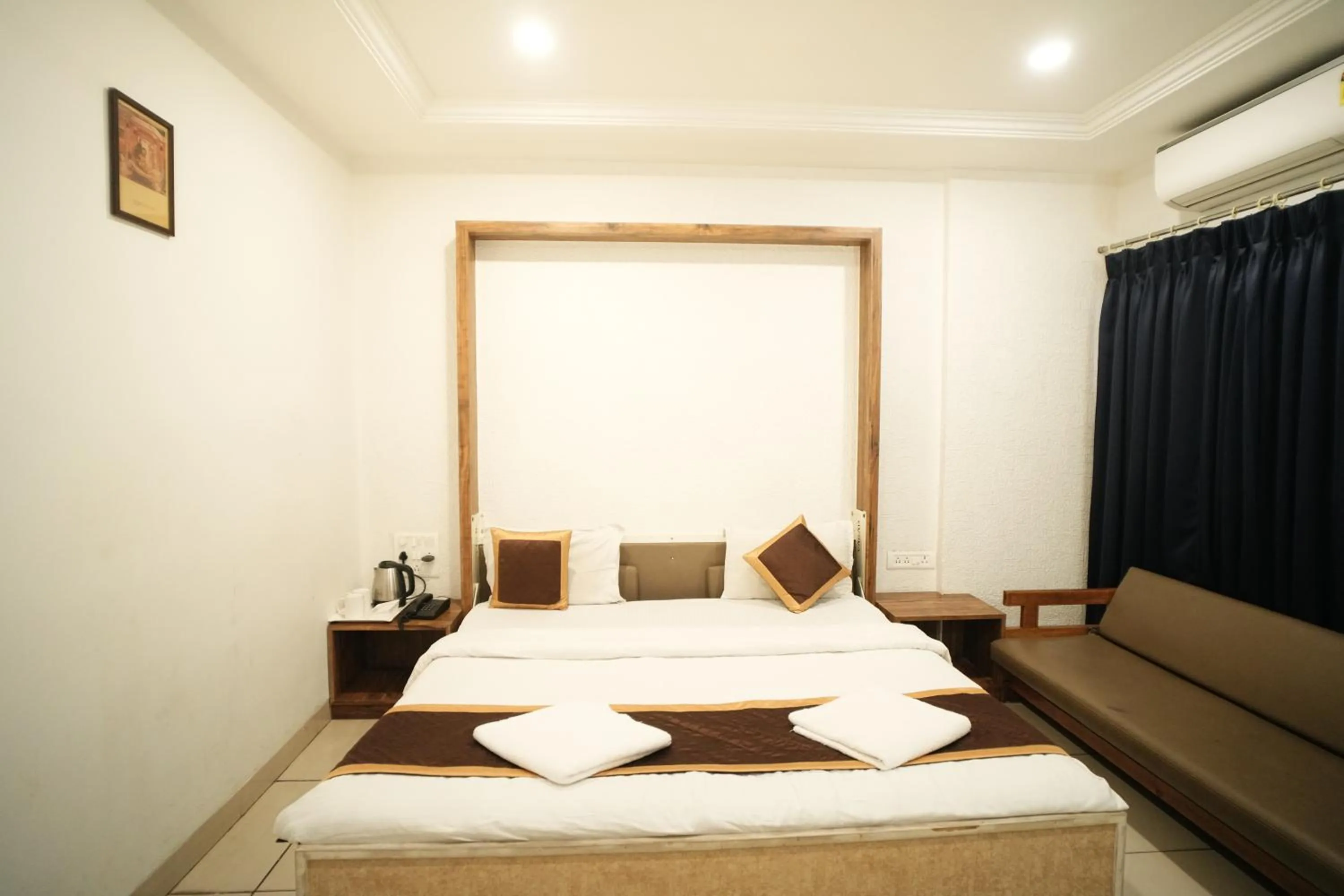 Bed in Hotel Kartiki