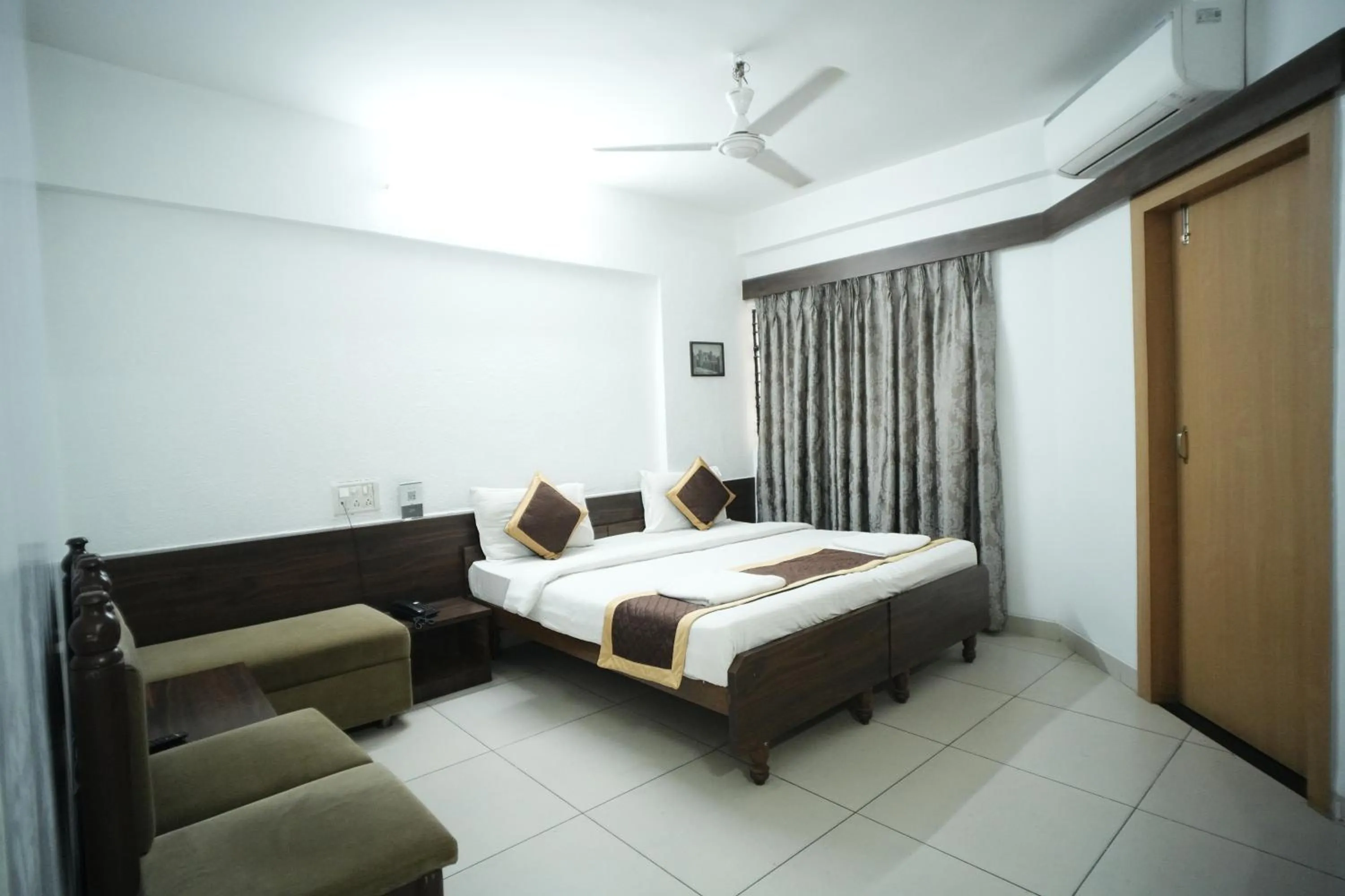 Bed in Hotel Kartiki