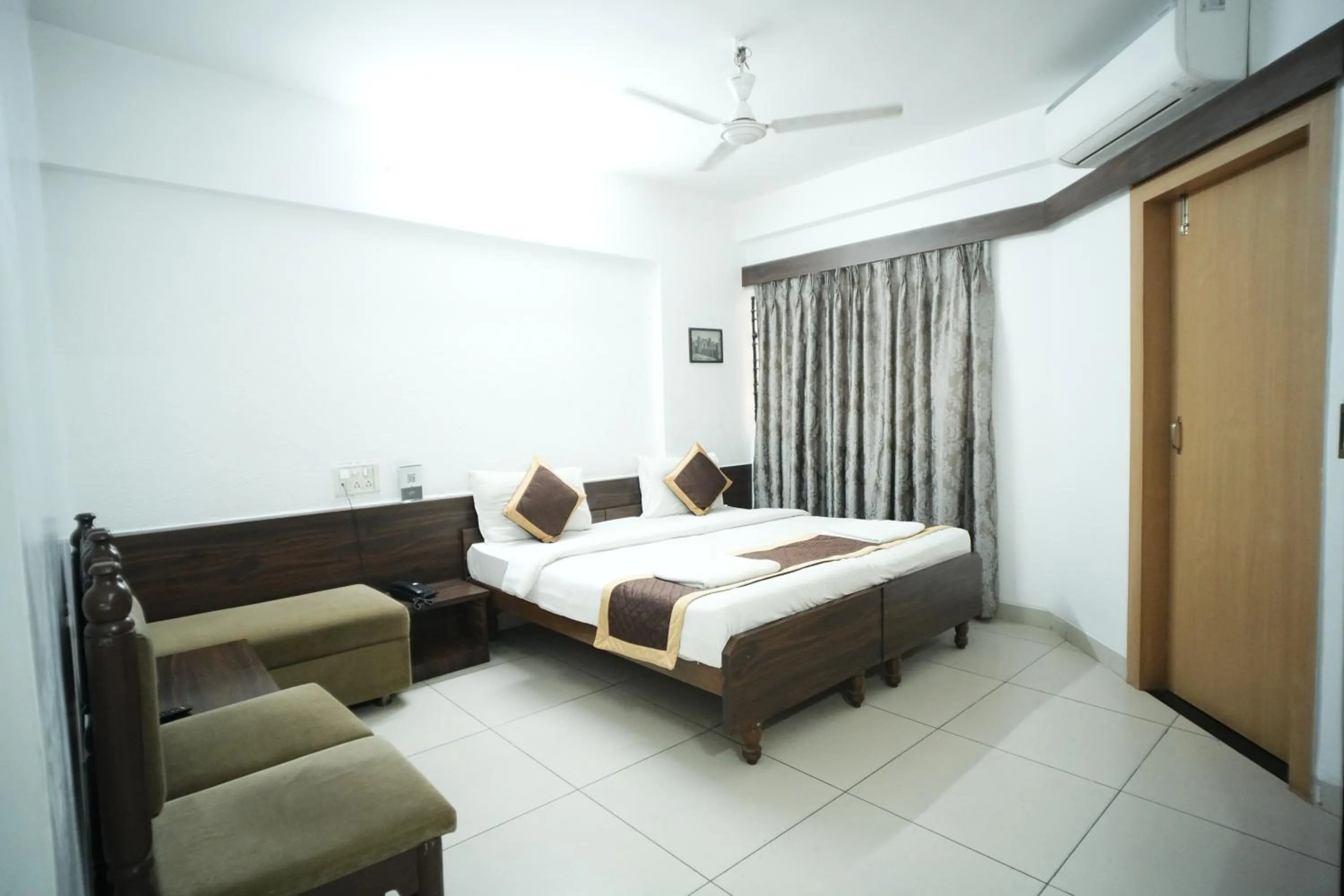 Bed in Hotel Kartiki