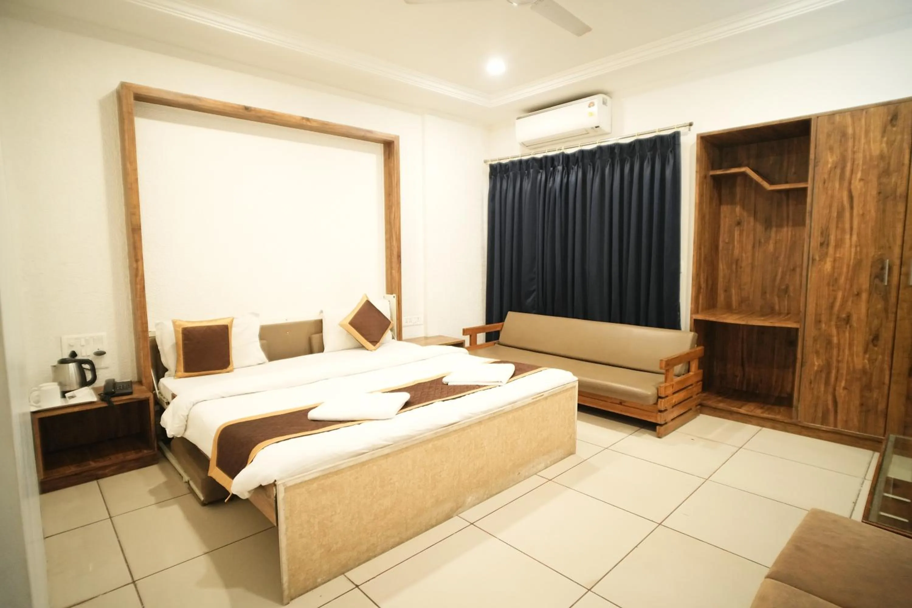 Bed in Hotel Kartiki