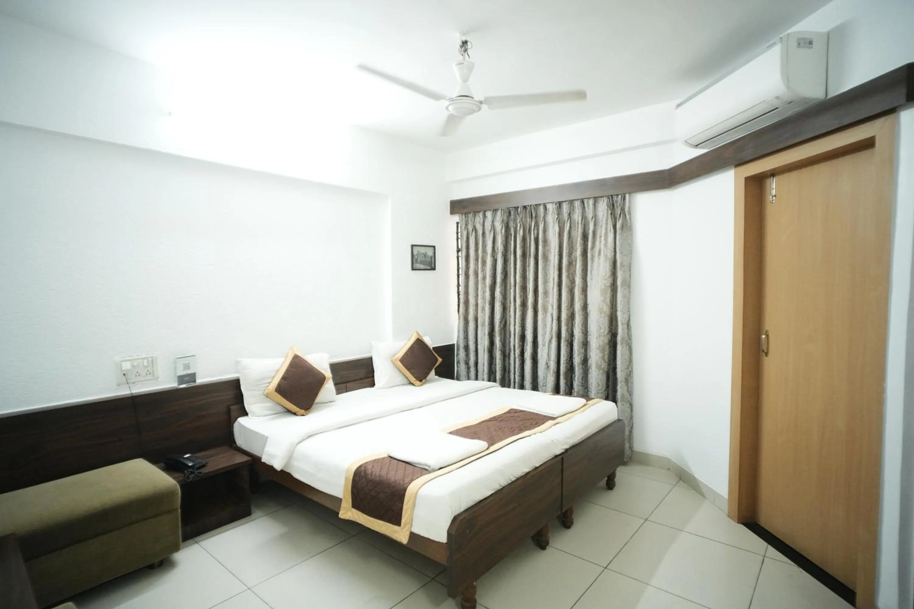 Bed in Hotel Kartiki