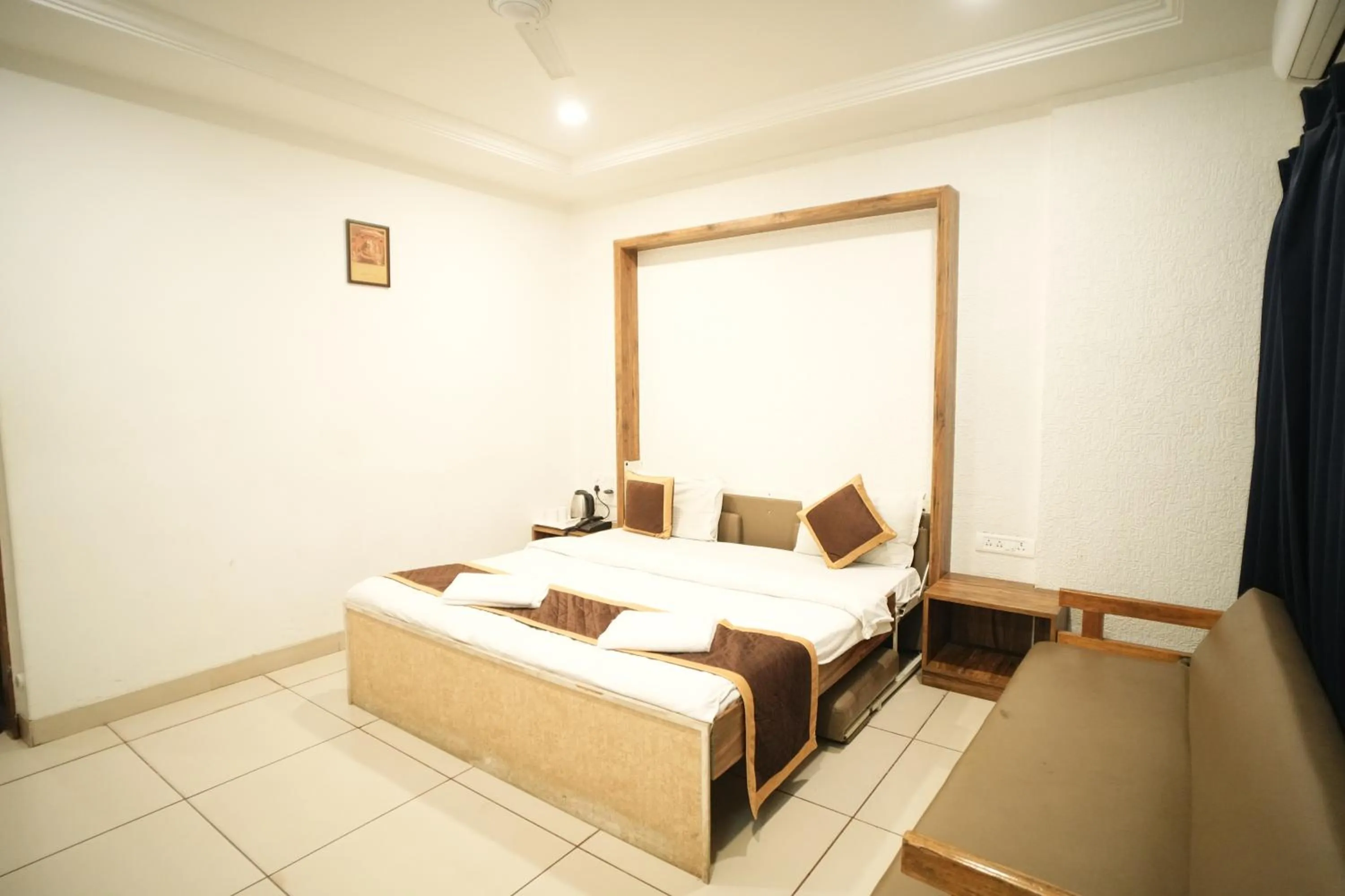 Bed in Hotel Kartiki