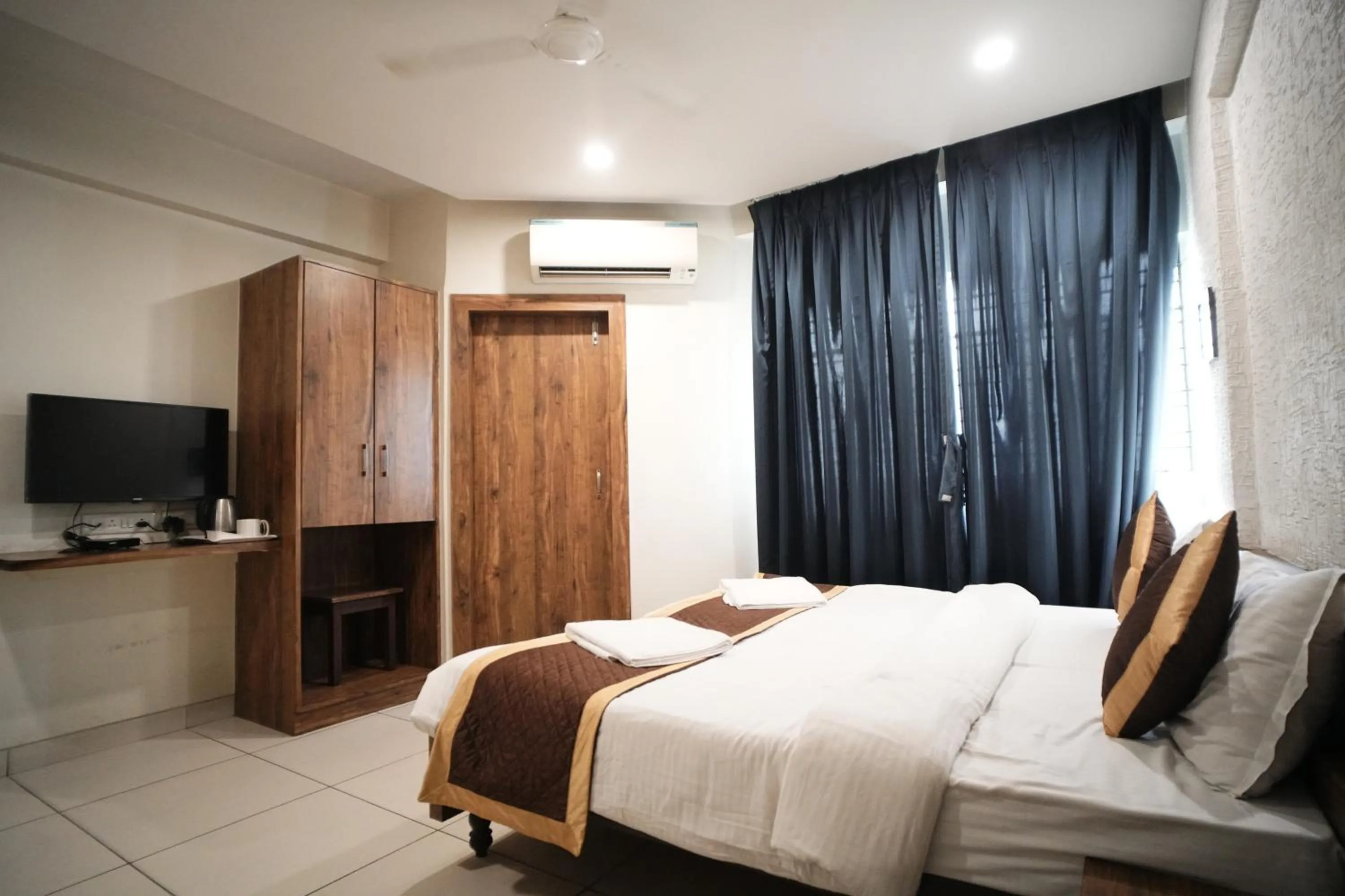 Bed in Hotel Kartiki