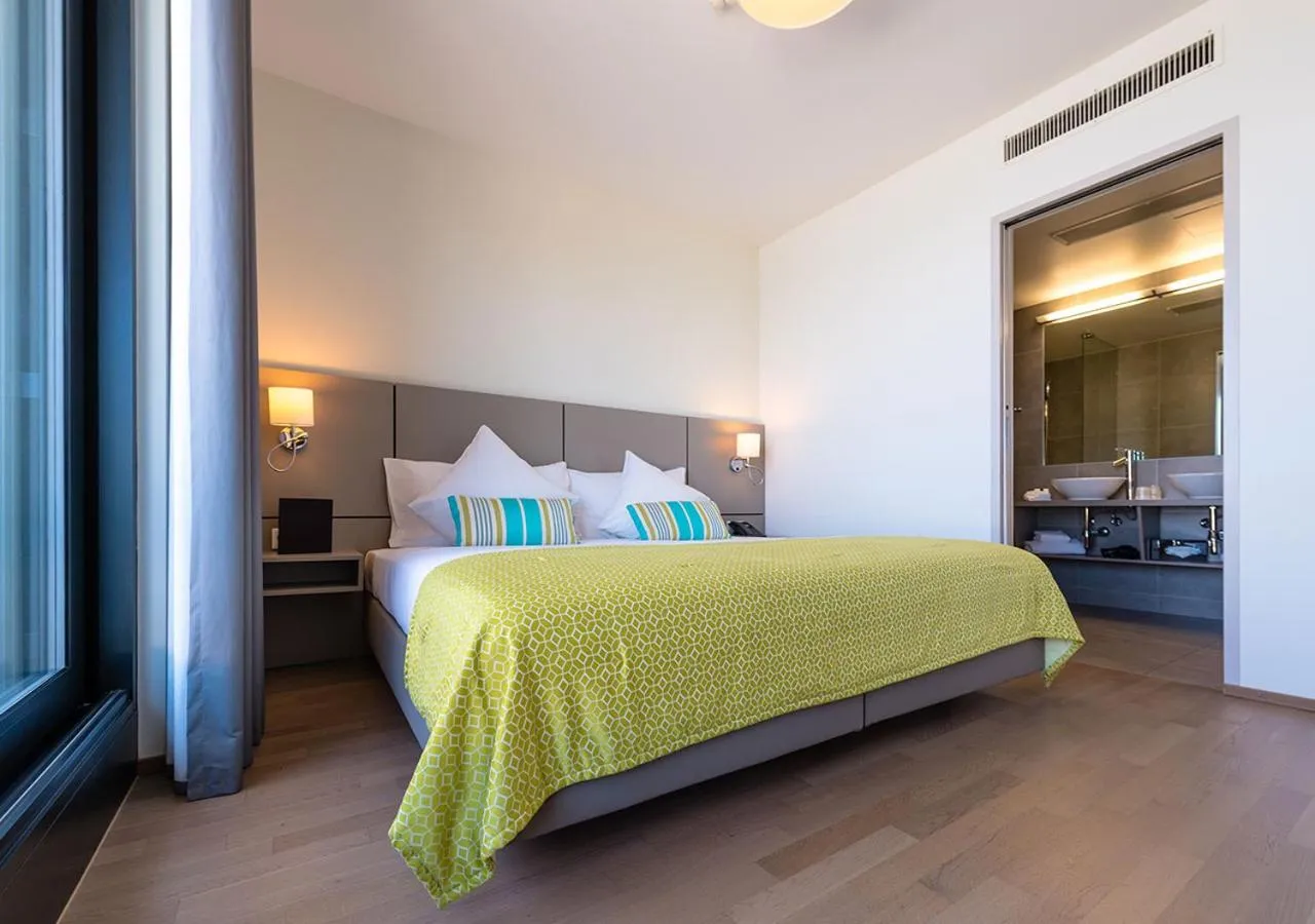 Bed in Lake Geneva Hotel