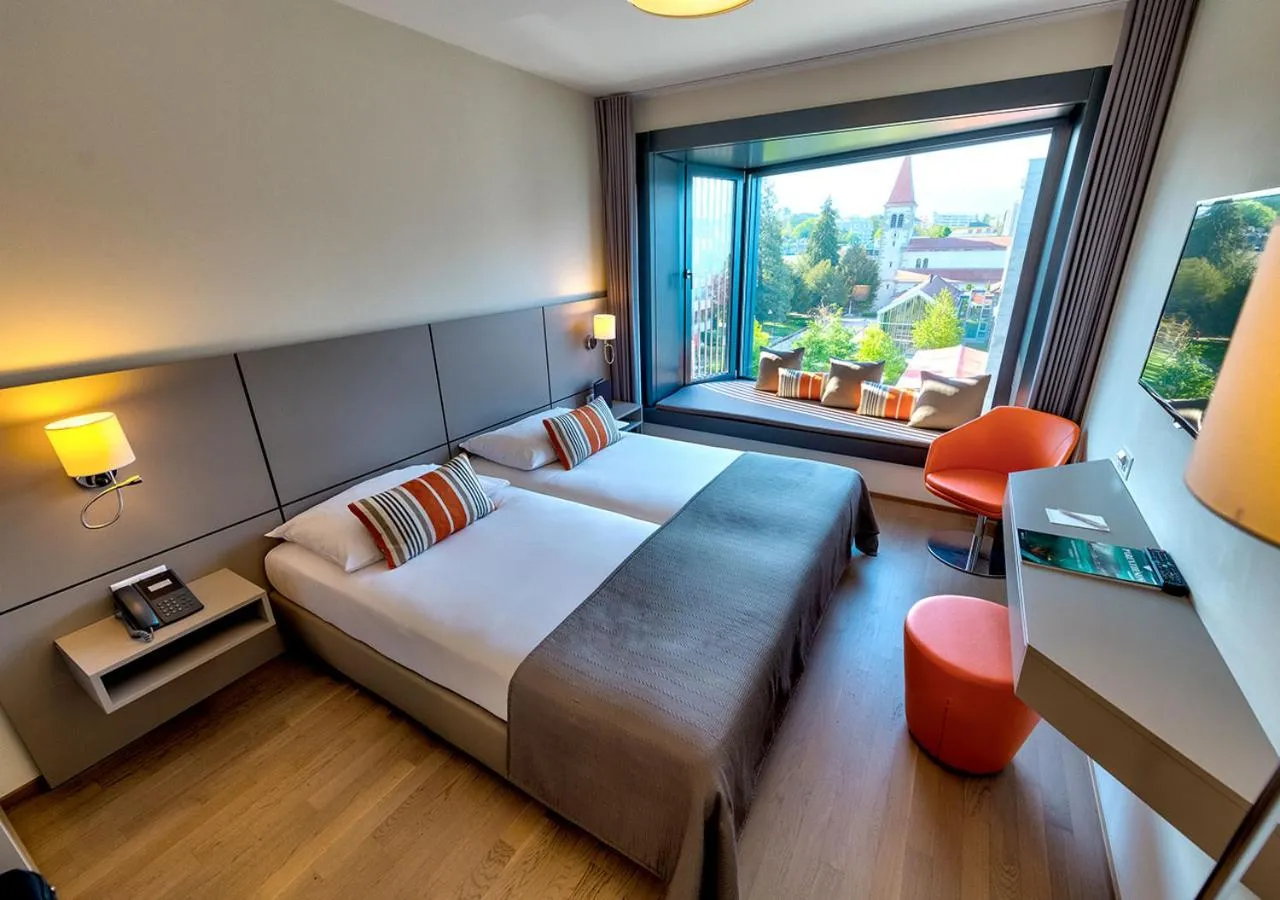 Photo of the whole room, Bed in Lake Geneva Hotel