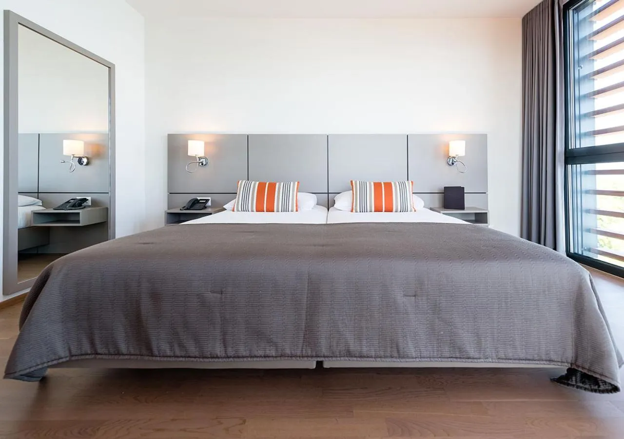 Bed in Lake Geneva Hotel