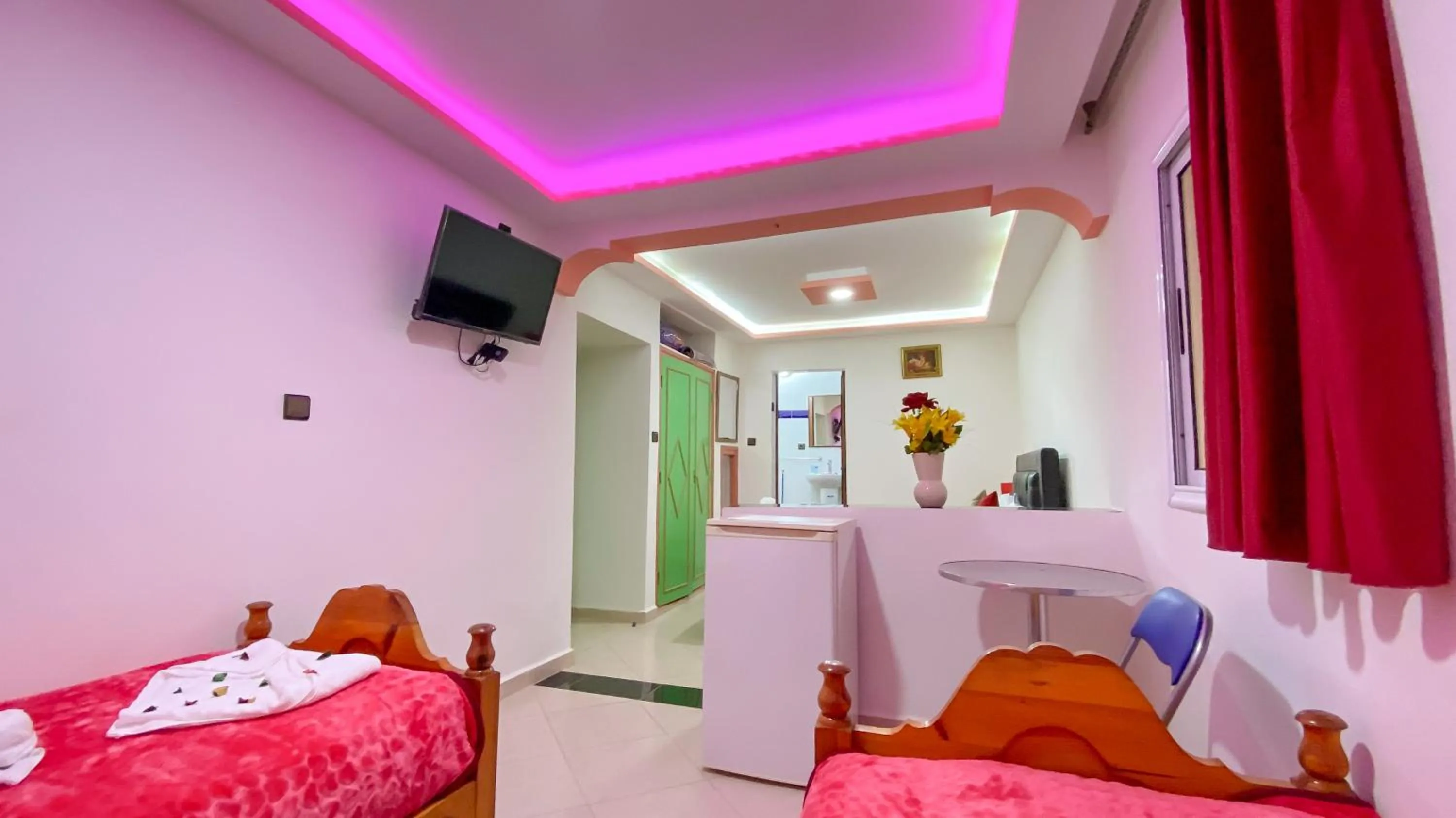 Communal lounge/ TV room, Bed in Hotel EL MARSA LA PLAYA