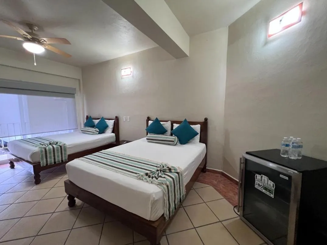 Bed in HOTEL EL CORAL