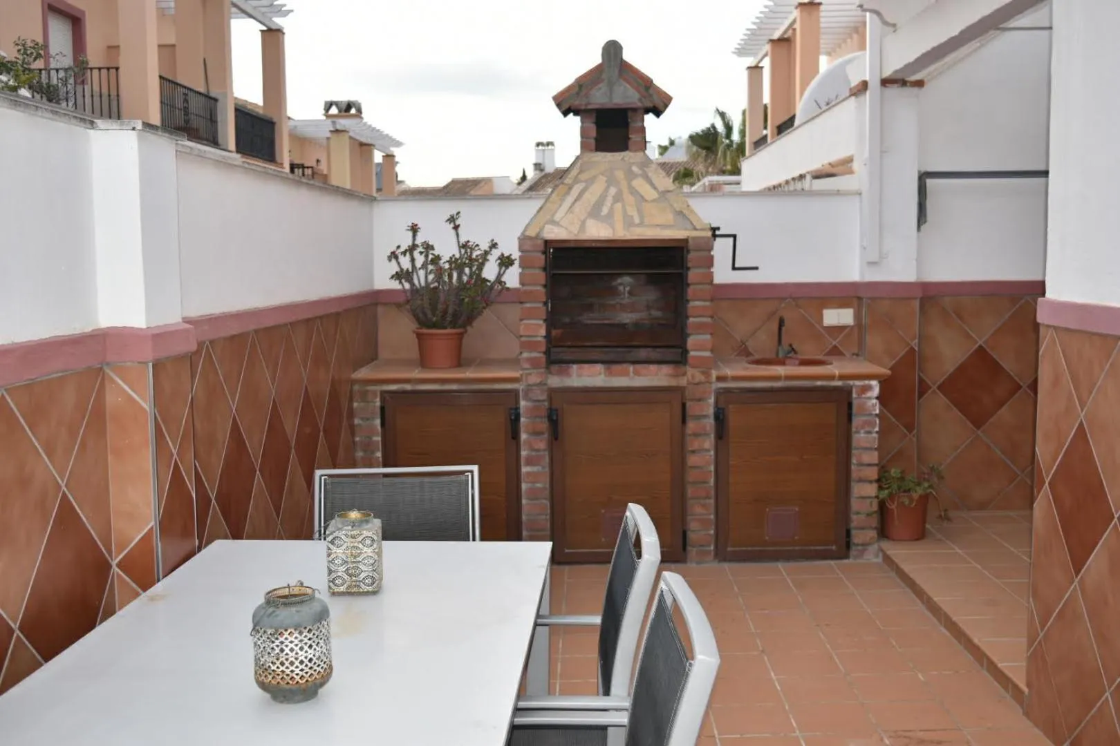 BBQ facilities in Apartamento zona playa de burriana con terraza