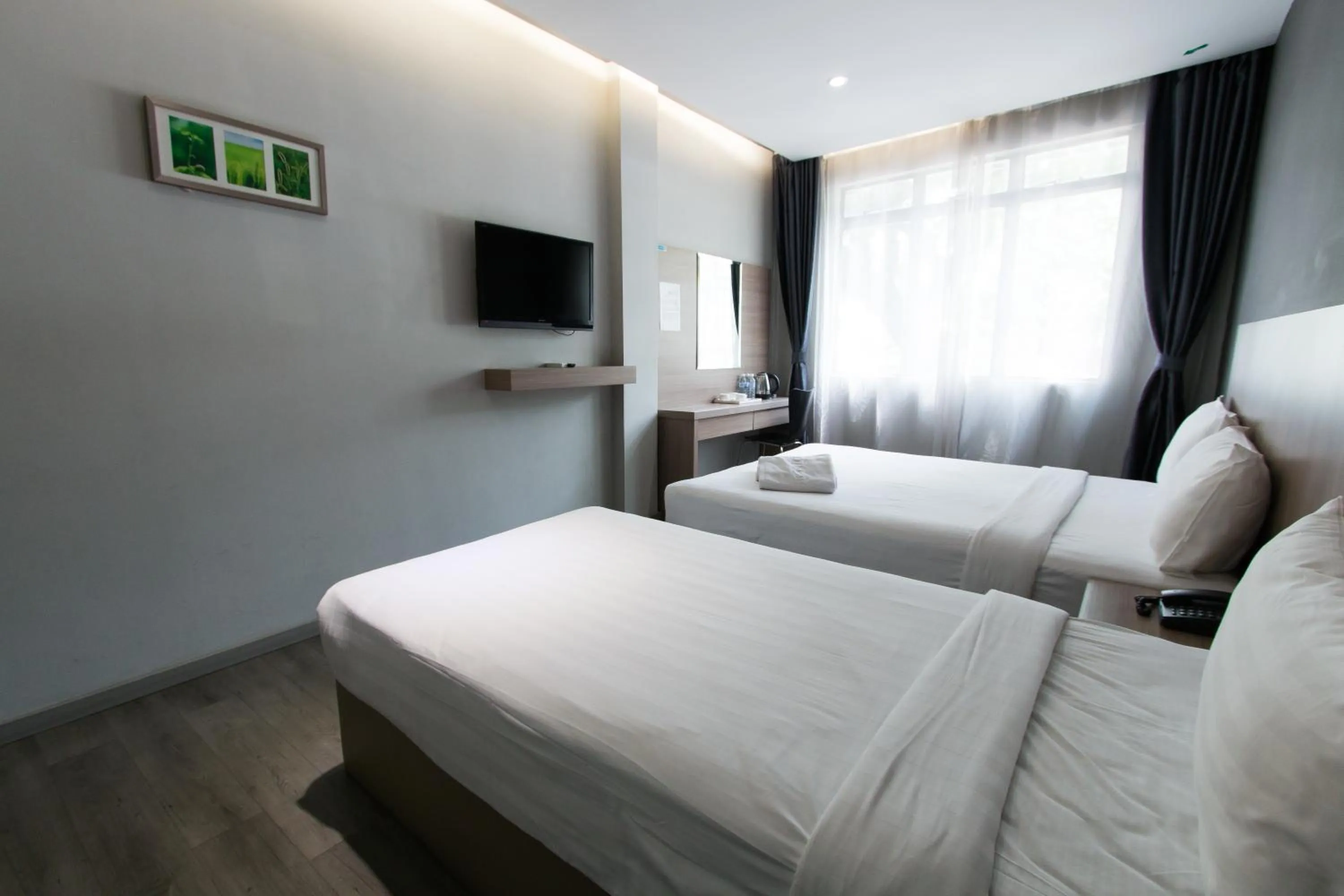 Communal lounge/ TV room, Bed in Hotel 99 Kuala Lumpur City